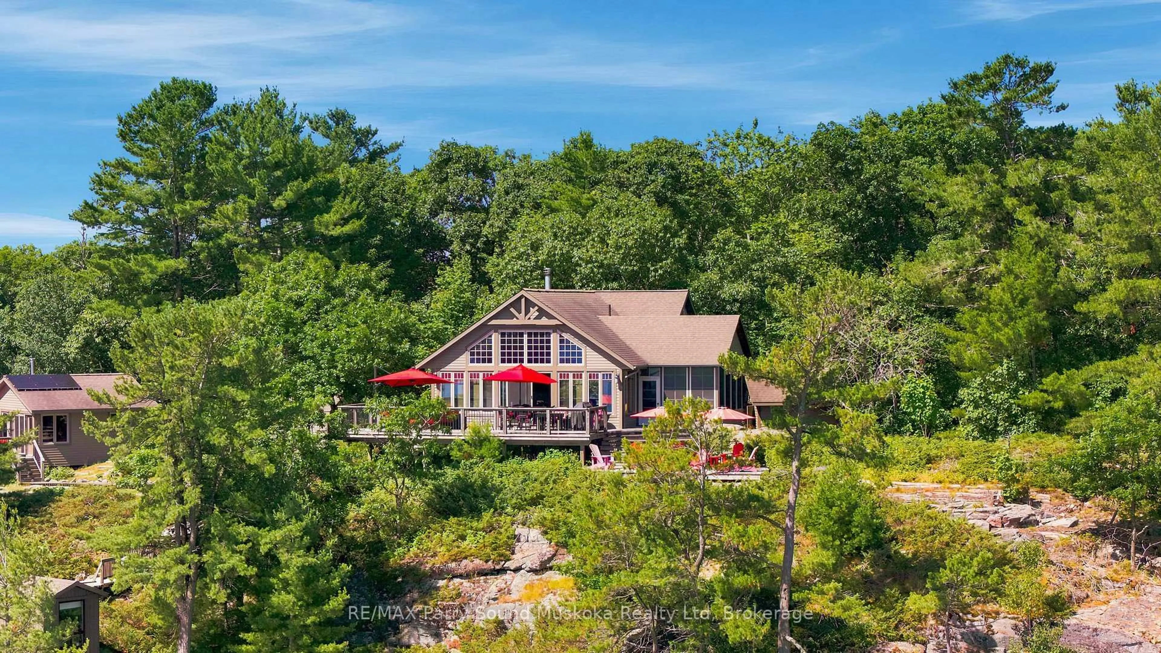 A pic from outside/outdoor area/front of a property/back of a property/a pic from drone, water/lake/river/ocean view for 43 15C Island, Carling Ontario P0H 1G0