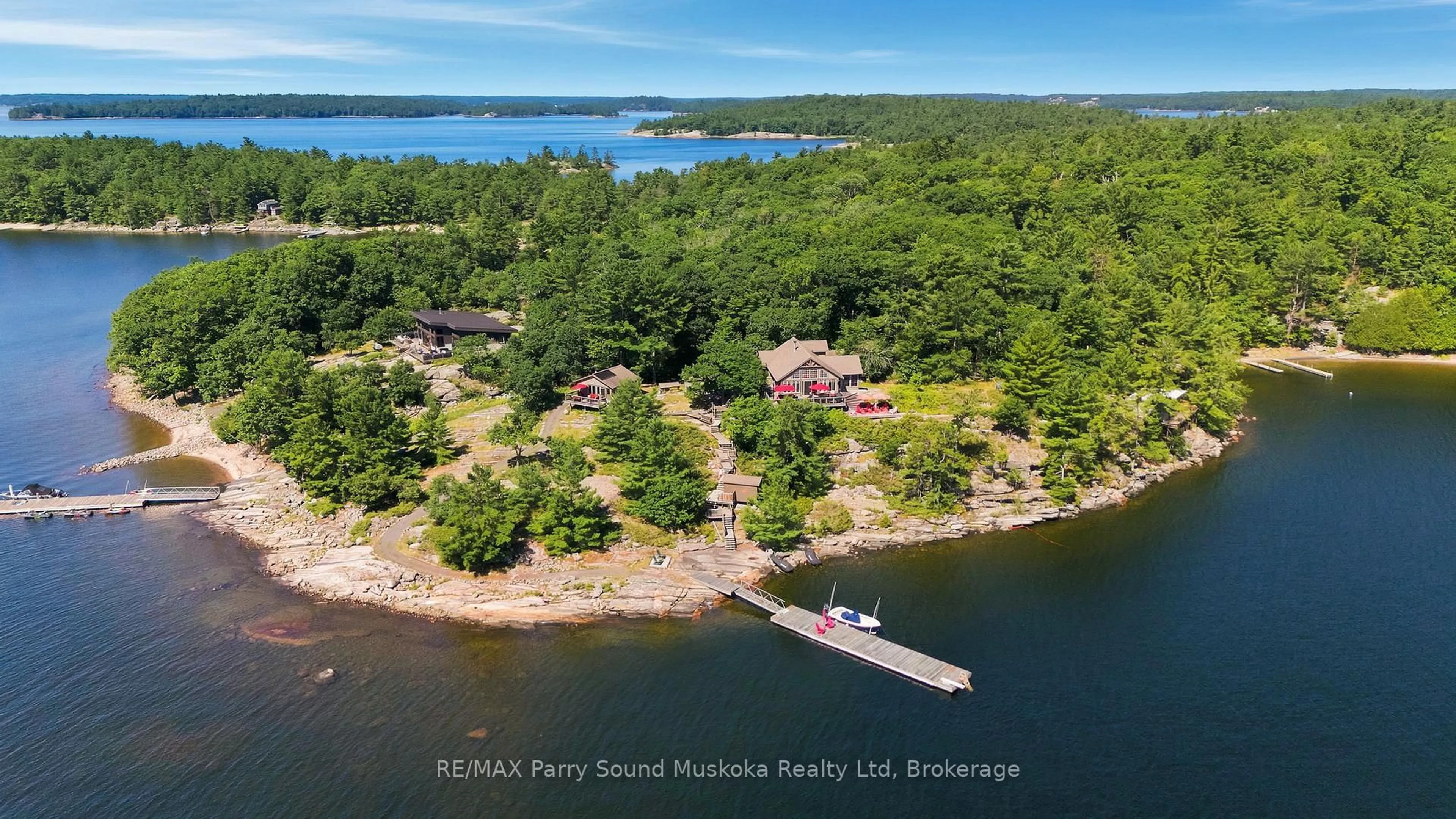 A pic from outside/outdoor area/front of a property/back of a property/a pic from drone, water/lake/river/ocean view for 43 15C Island, Carling Ontario P0H 1G0