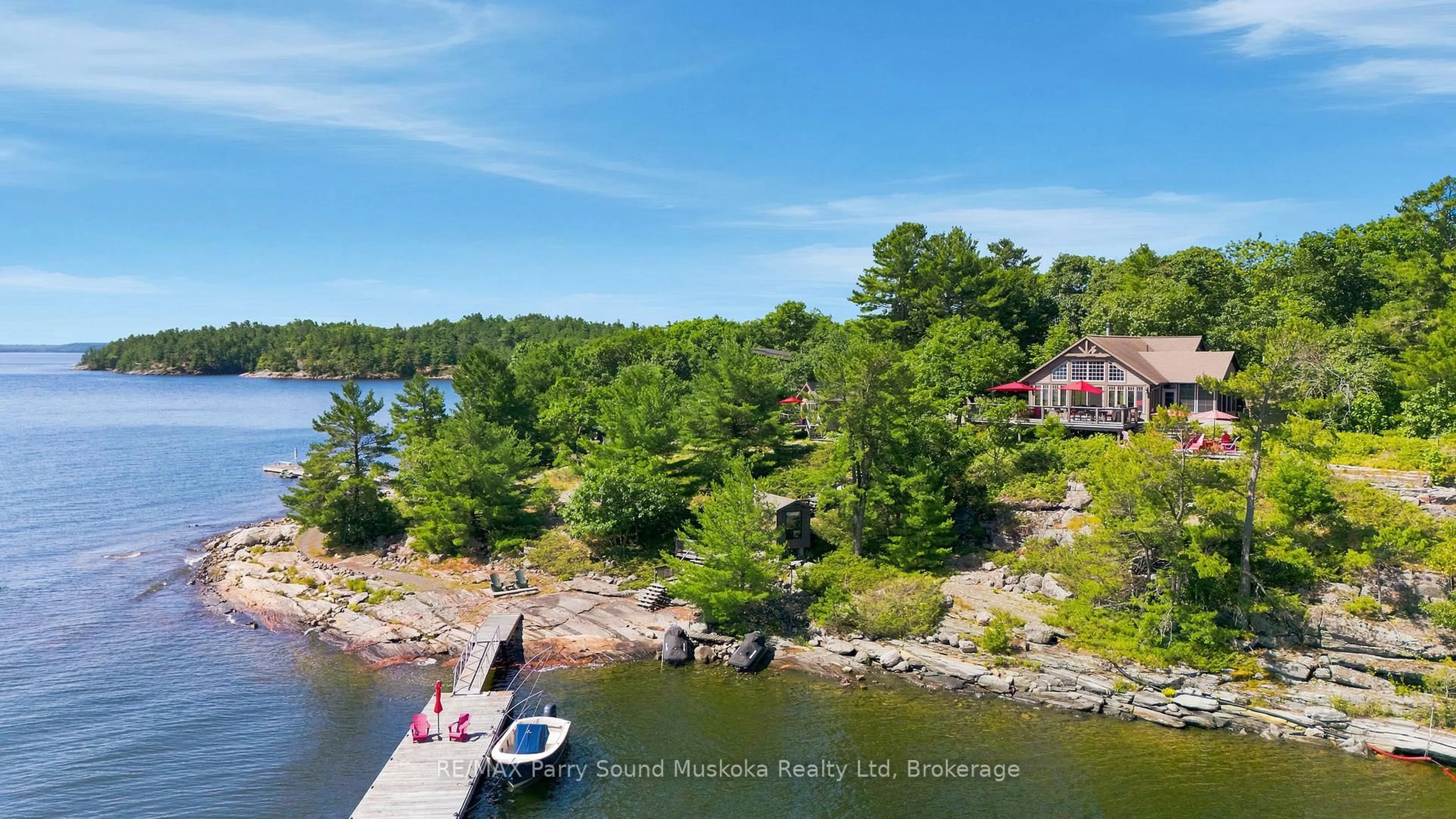 A pic from outside/outdoor area/front of a property/back of a property/a pic from drone, water/lake/river/ocean view for 43 15C Island, Carling Ontario P0H 1G0