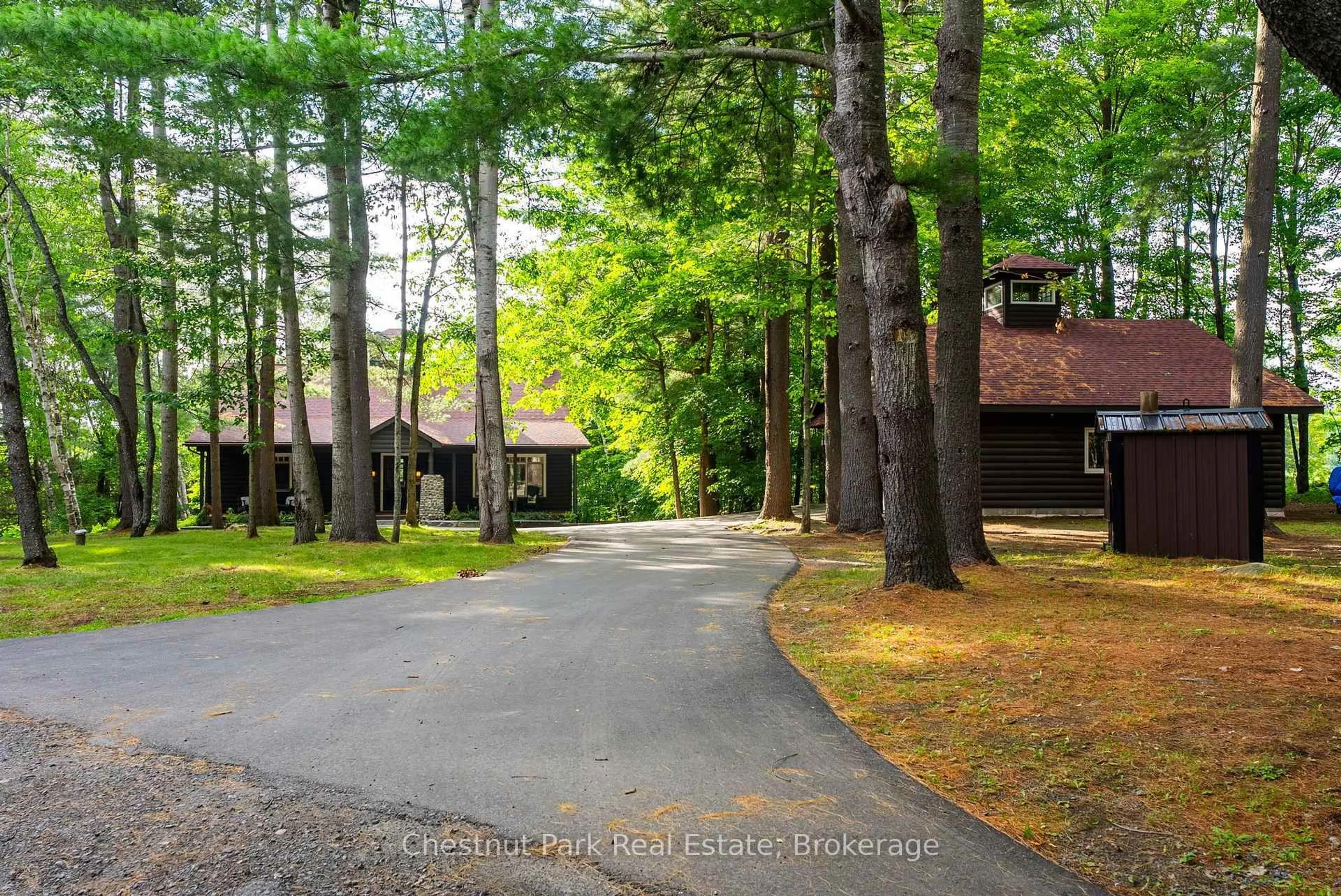 Patio, forest/trees view for 90 Swallowdale Rd, Huntsville Ontario P1H 0A5