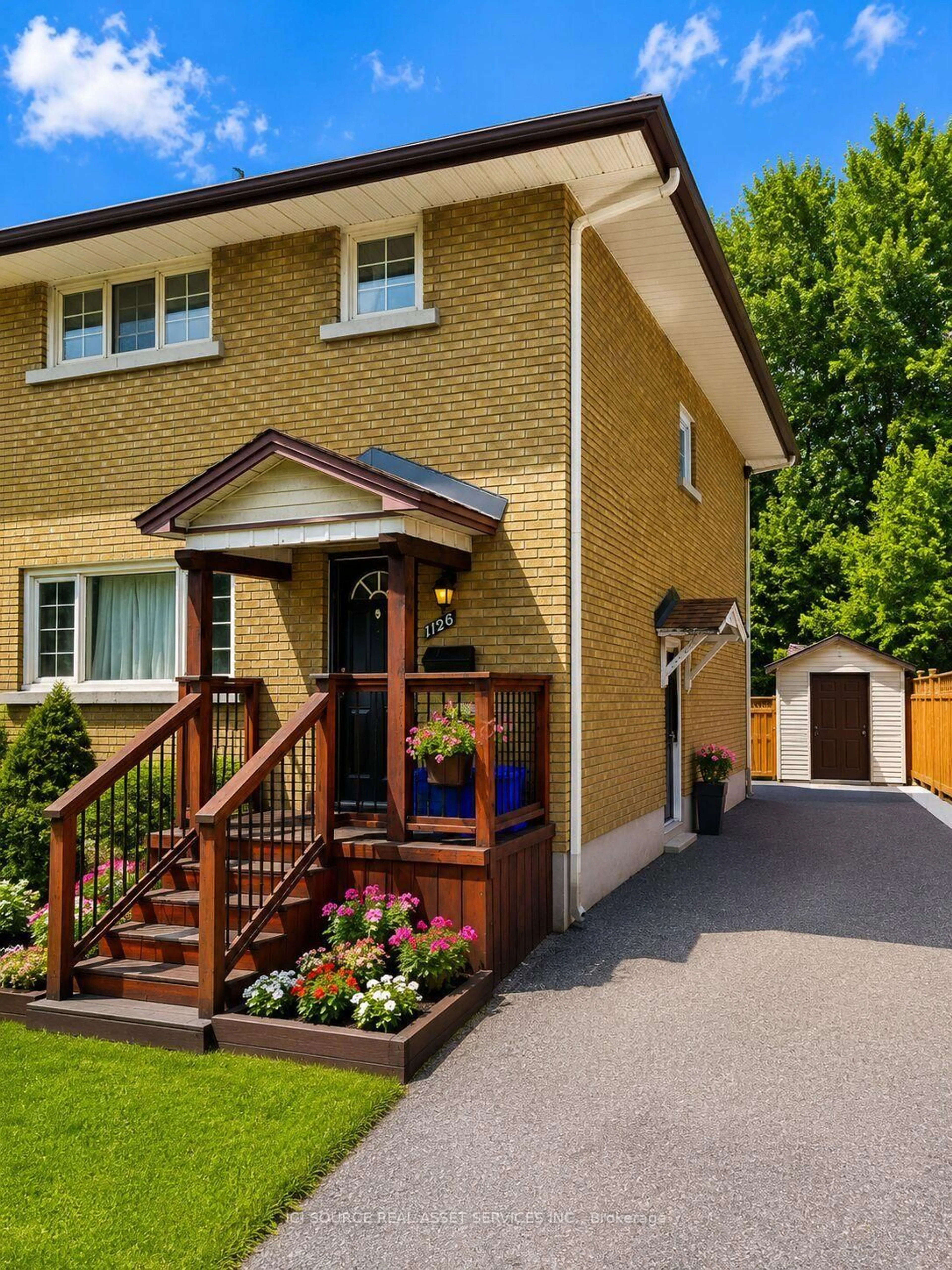 Home with brick exterior material, street for 1126 Woodroffe Ave, Ottawa Ontario K2C 2T1