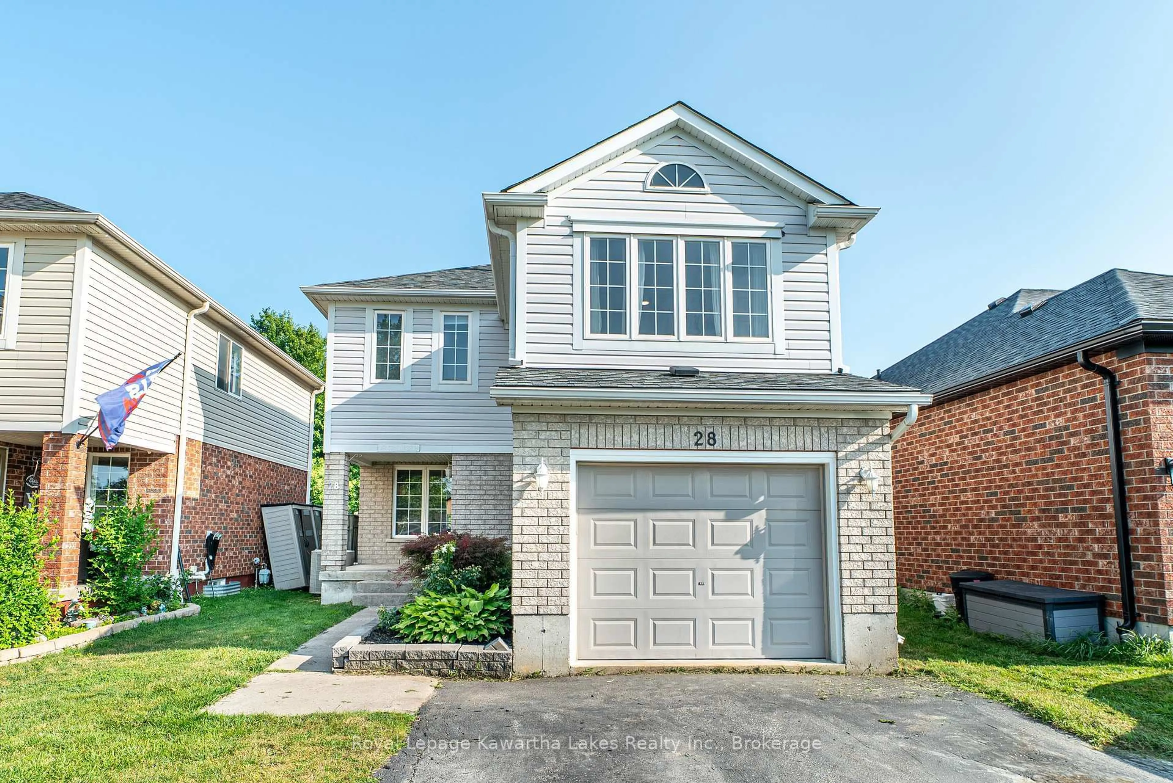 Home with brick exterior material, street for 28 Lang Crt, Kawartha Lakes Ontario K9V 6E5