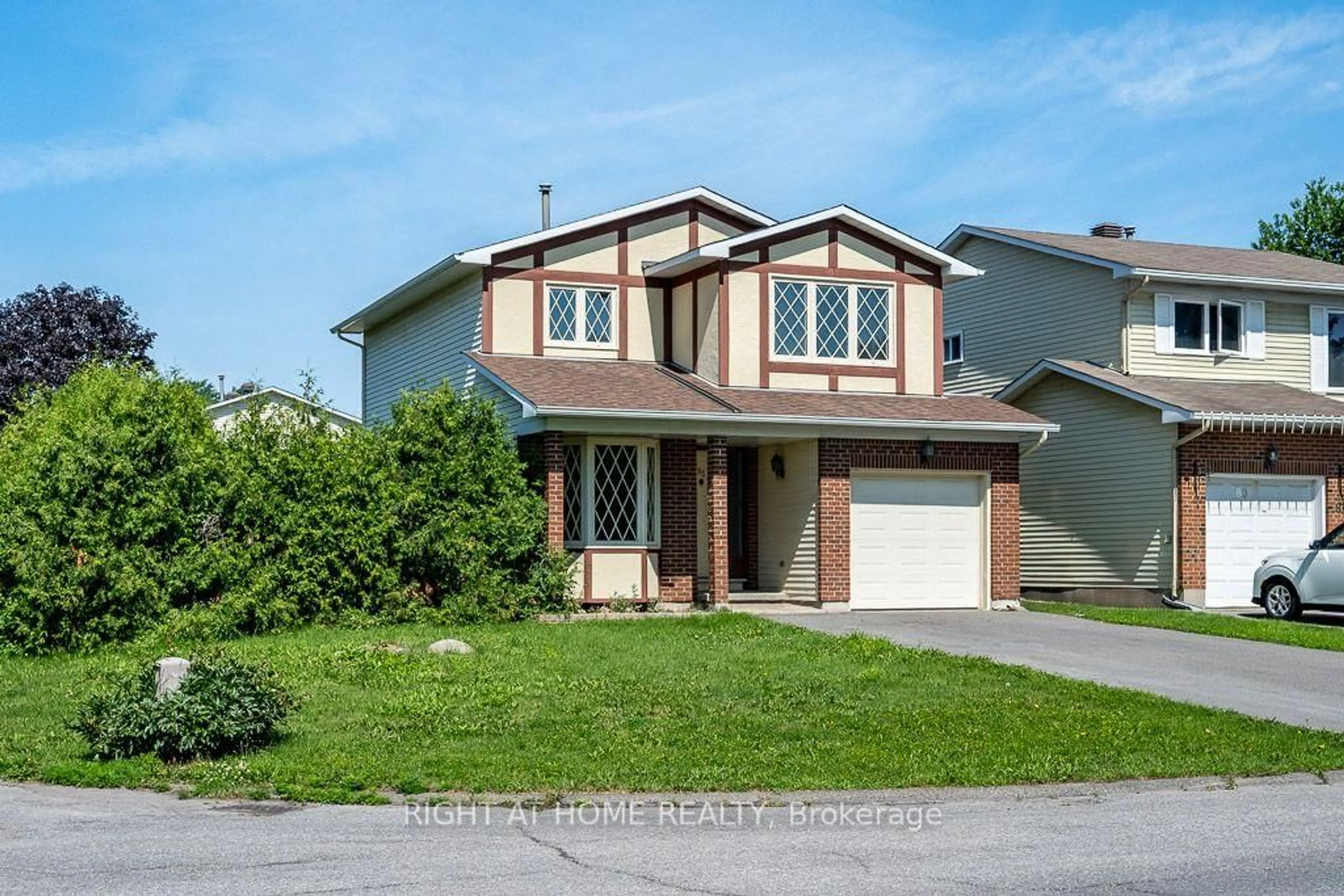 Home with vinyl exterior material, street for 85 Winchester Dr, Ottawa Ontario K2L 2R3