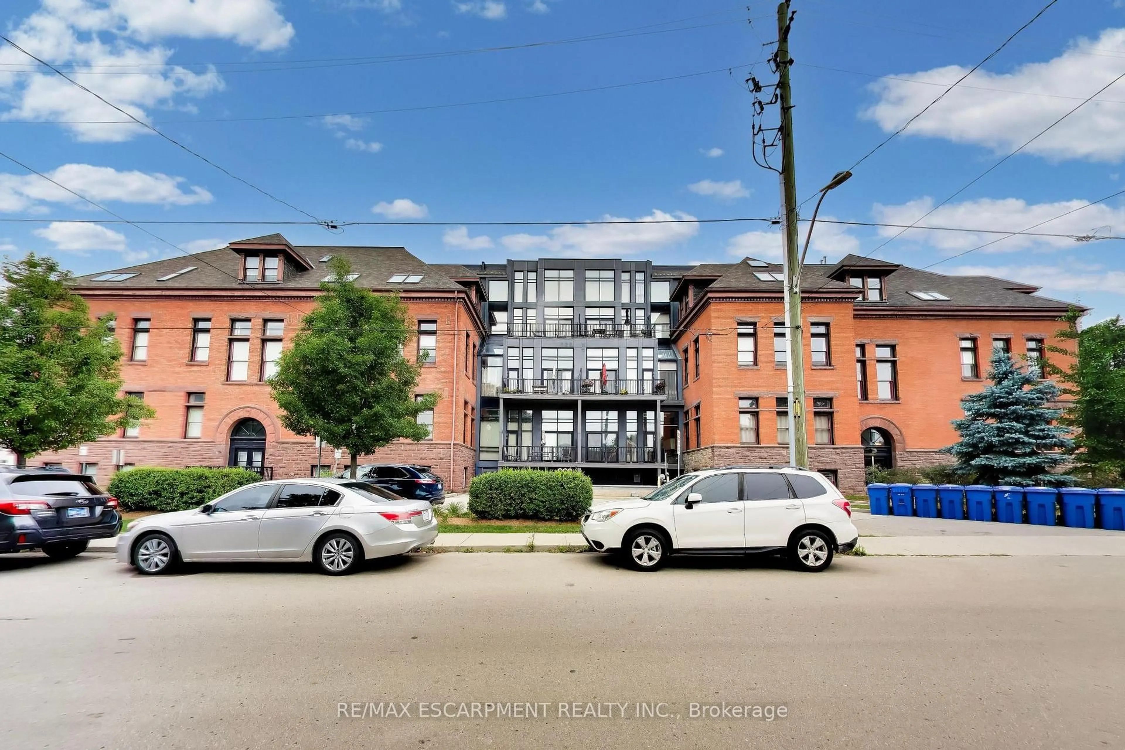 A pic from outside/outdoor area/front of a property/back of a property/a pic from drone, street for 200 Stinson St #Unit #207, Hamilton Ontario L8N 4J5
