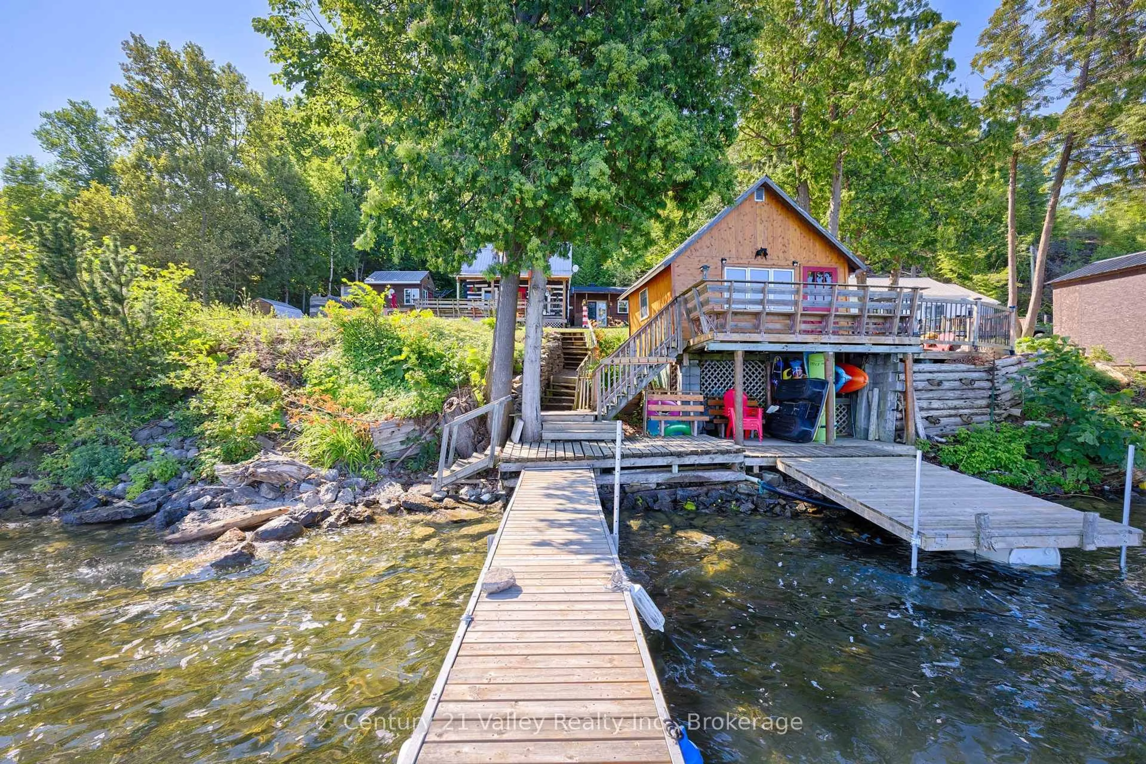 A pic from outside/outdoor area/front of a property/back of a property/a pic from drone, water/lake/river/ocean view for 763 Lake Clear Rd, Eganville Ontario K0J 1T0