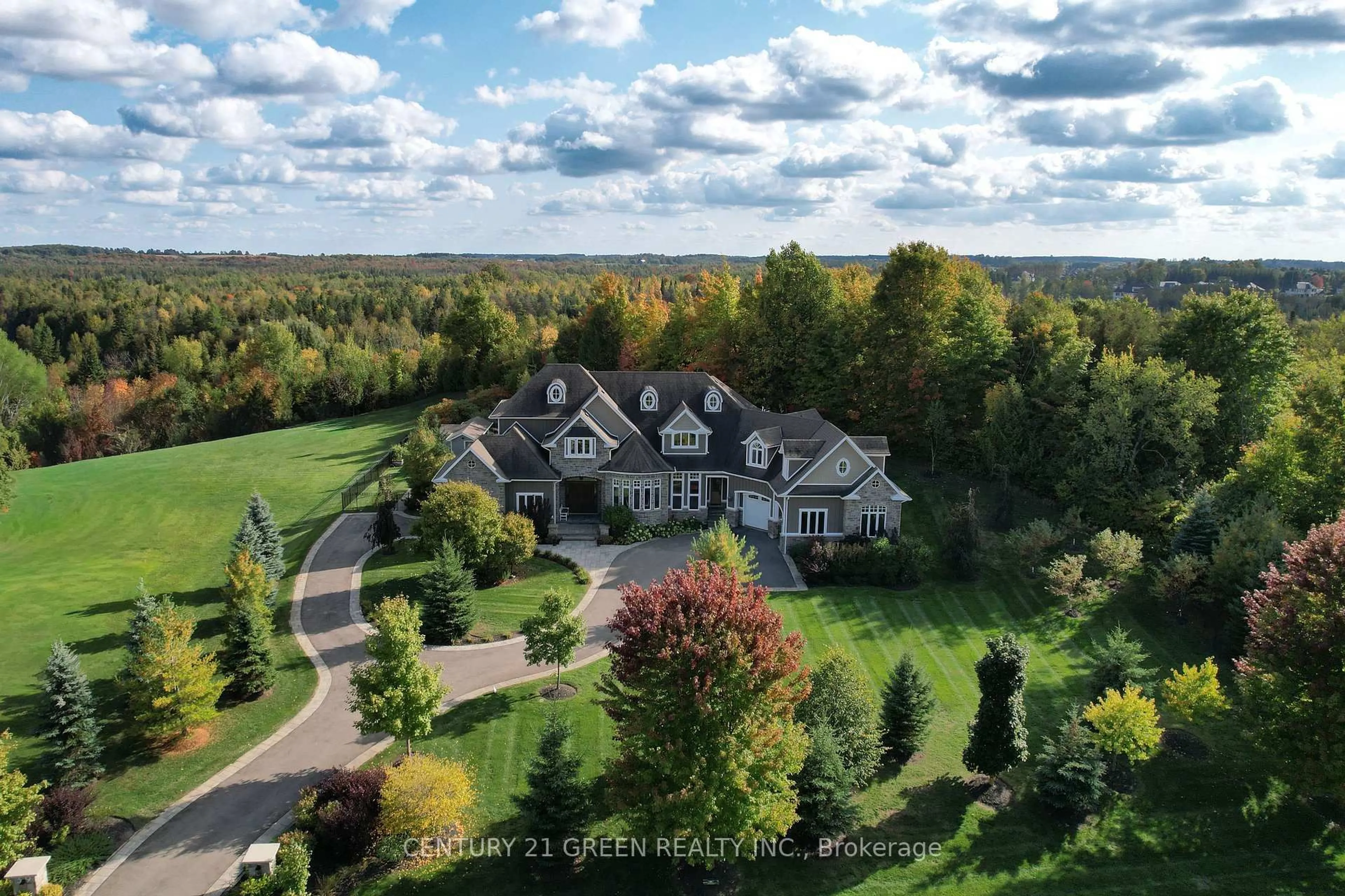A pic from outside/outdoor area/front of a property/back of a property/a pic from drone, unknown for 39 Brookhaven Cres, East Garafraxa Ontario L9W 7M9