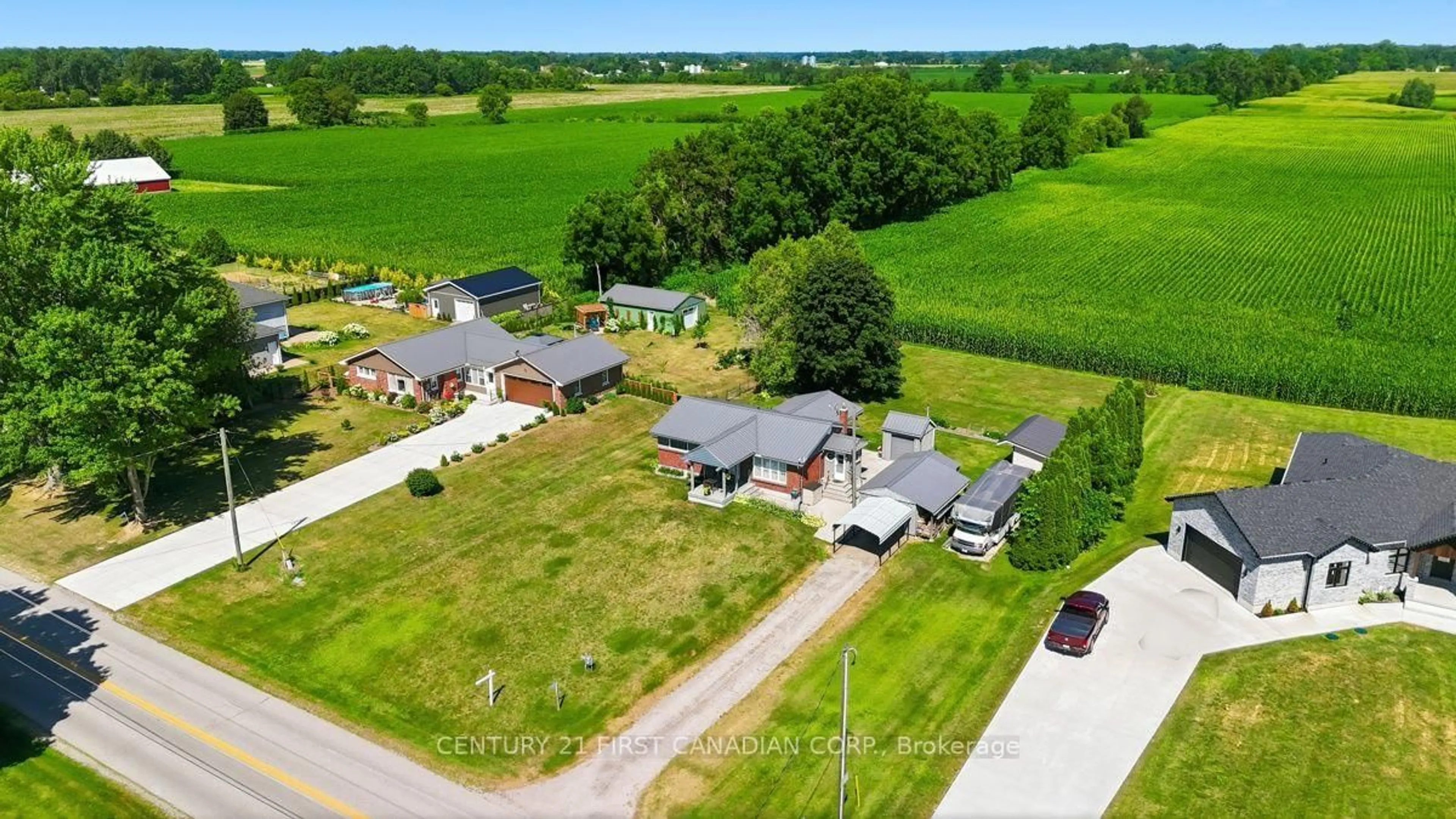 A pic from outside/outdoor area/front of a property/back of a property/a pic from drone, unknown for 22656 Queens Line, West Elgin Ontario N0L 2C0