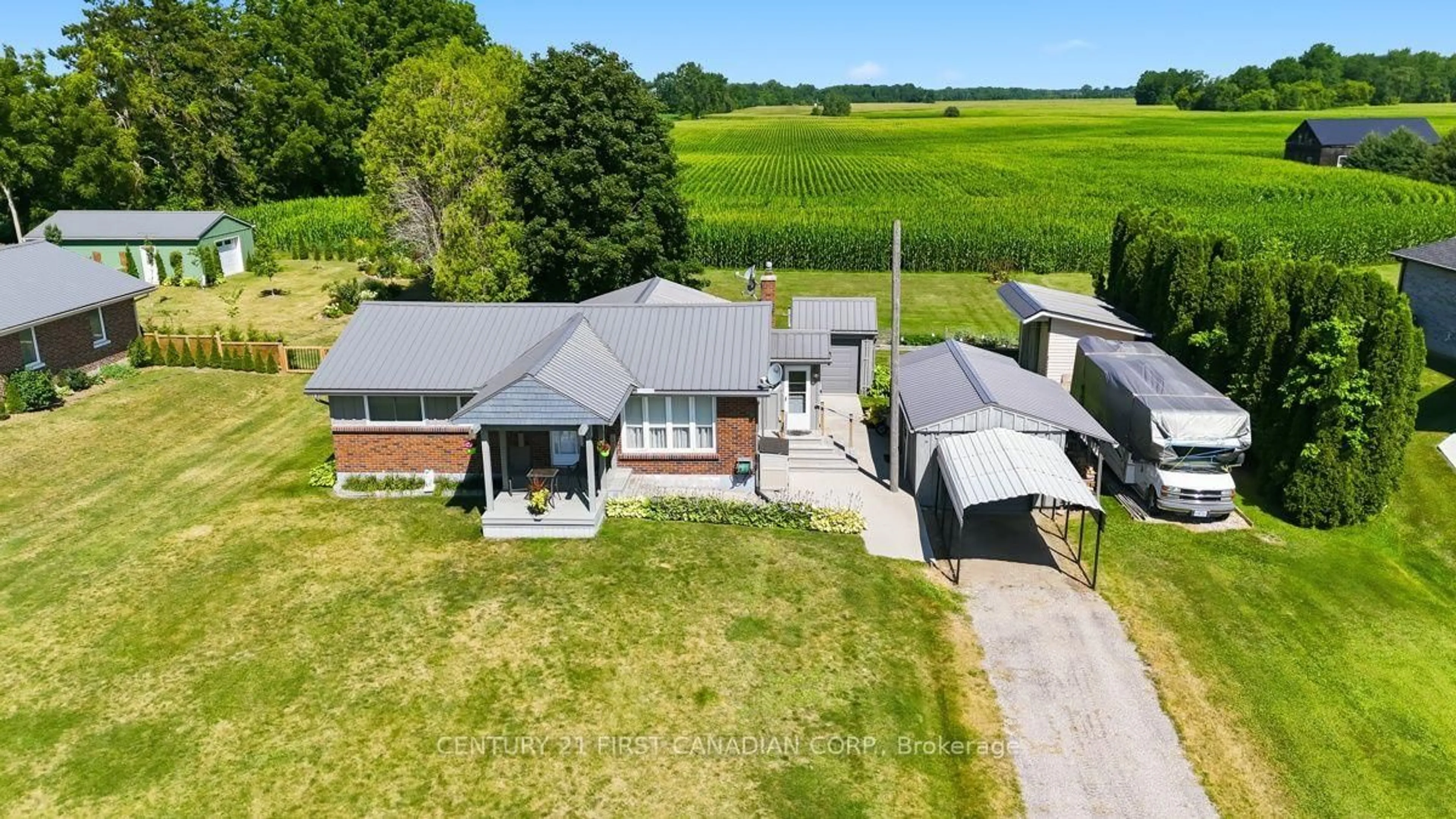 A pic from outside/outdoor area/front of a property/back of a property/a pic from drone, unknown for 22656 Queens Line, West Elgin Ontario N0L 2C0