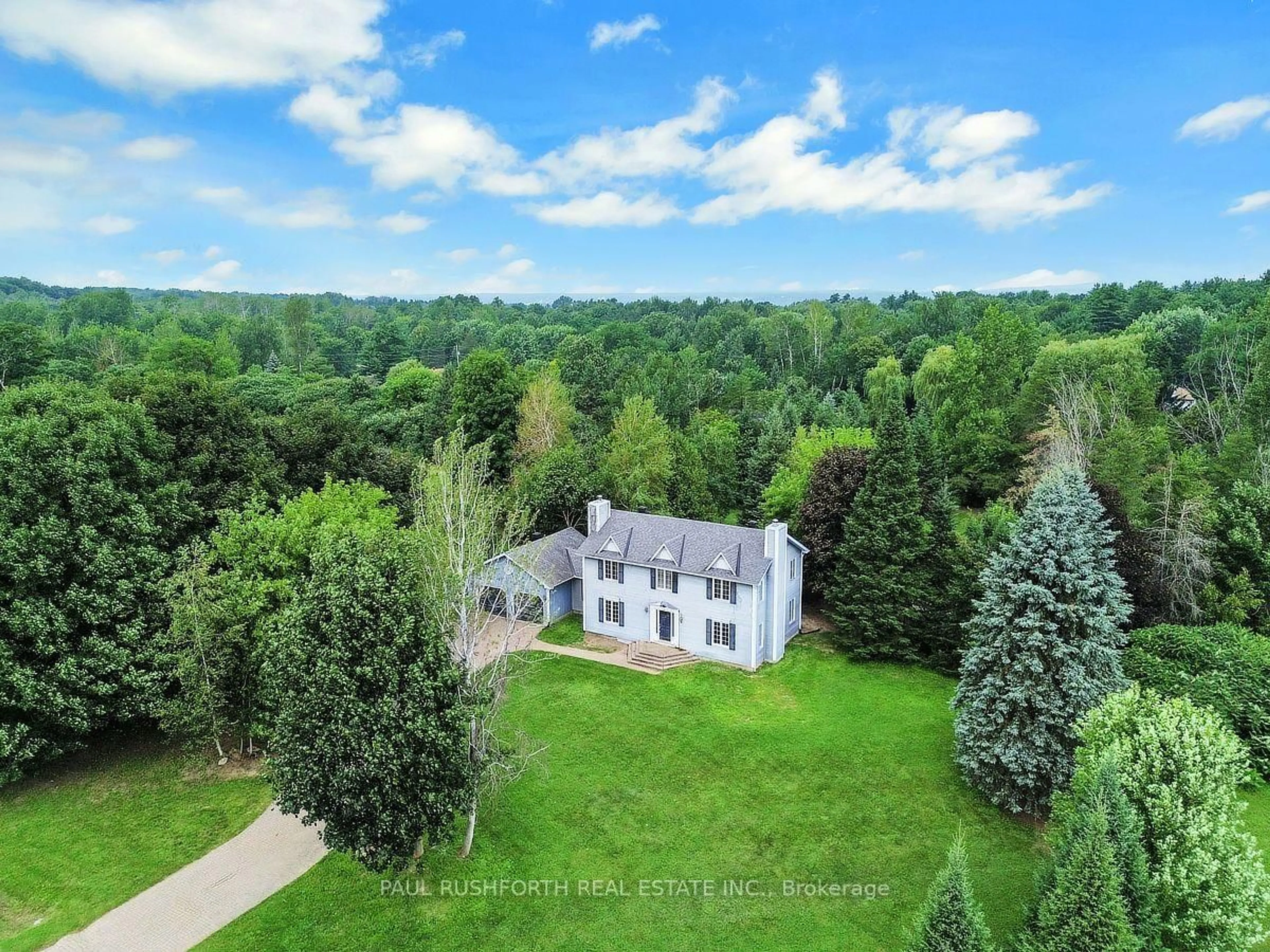 A pic from outside/outdoor area/front of a property/back of a property/a pic from drone, forest/trees view for 1545 Lough Dr, Ottawa Ontario K4C 1A9