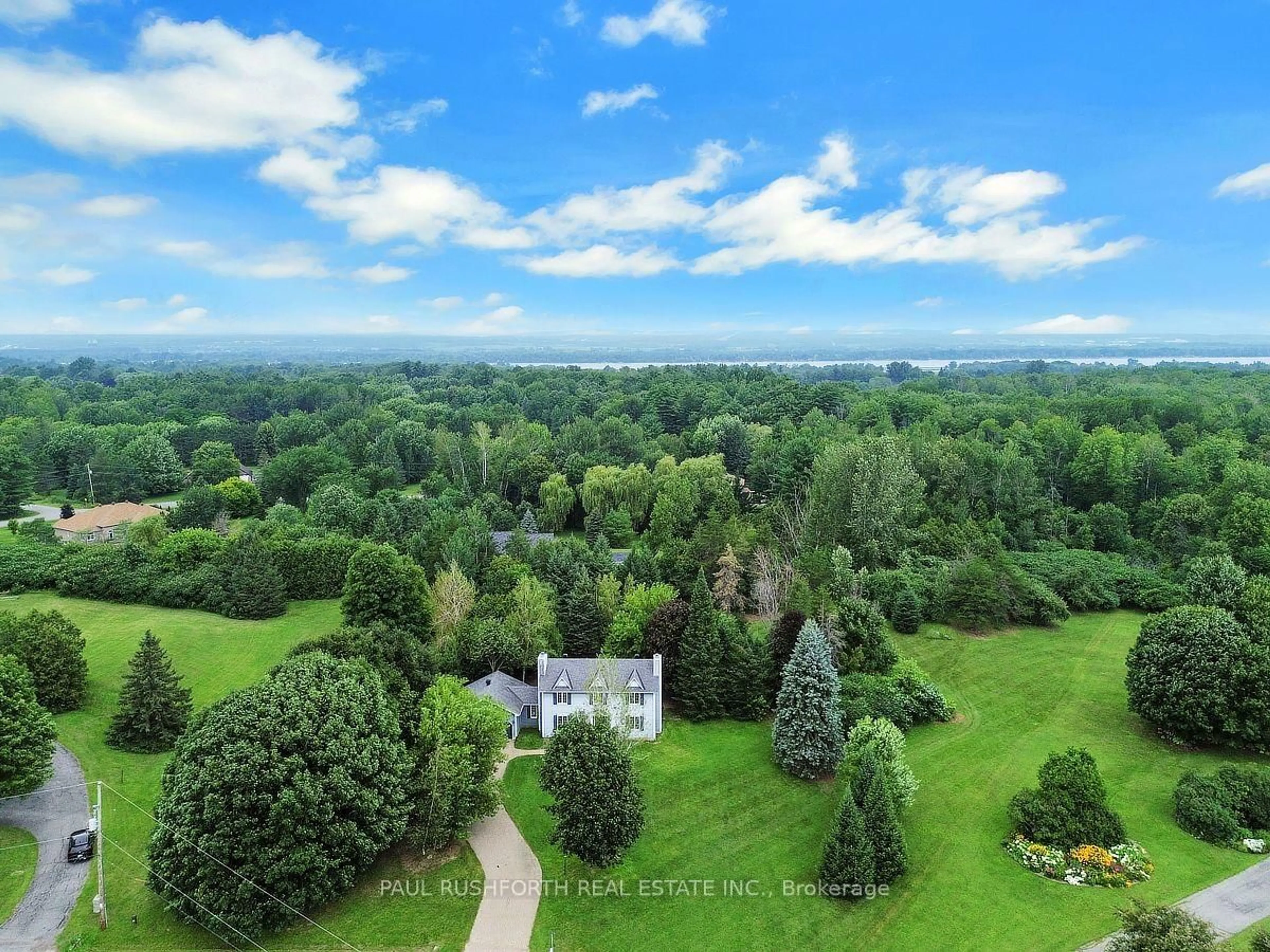 A pic from outside/outdoor area/front of a property/back of a property/a pic from drone, forest/trees view for 1545 Lough Dr, Ottawa Ontario K4C 1A9