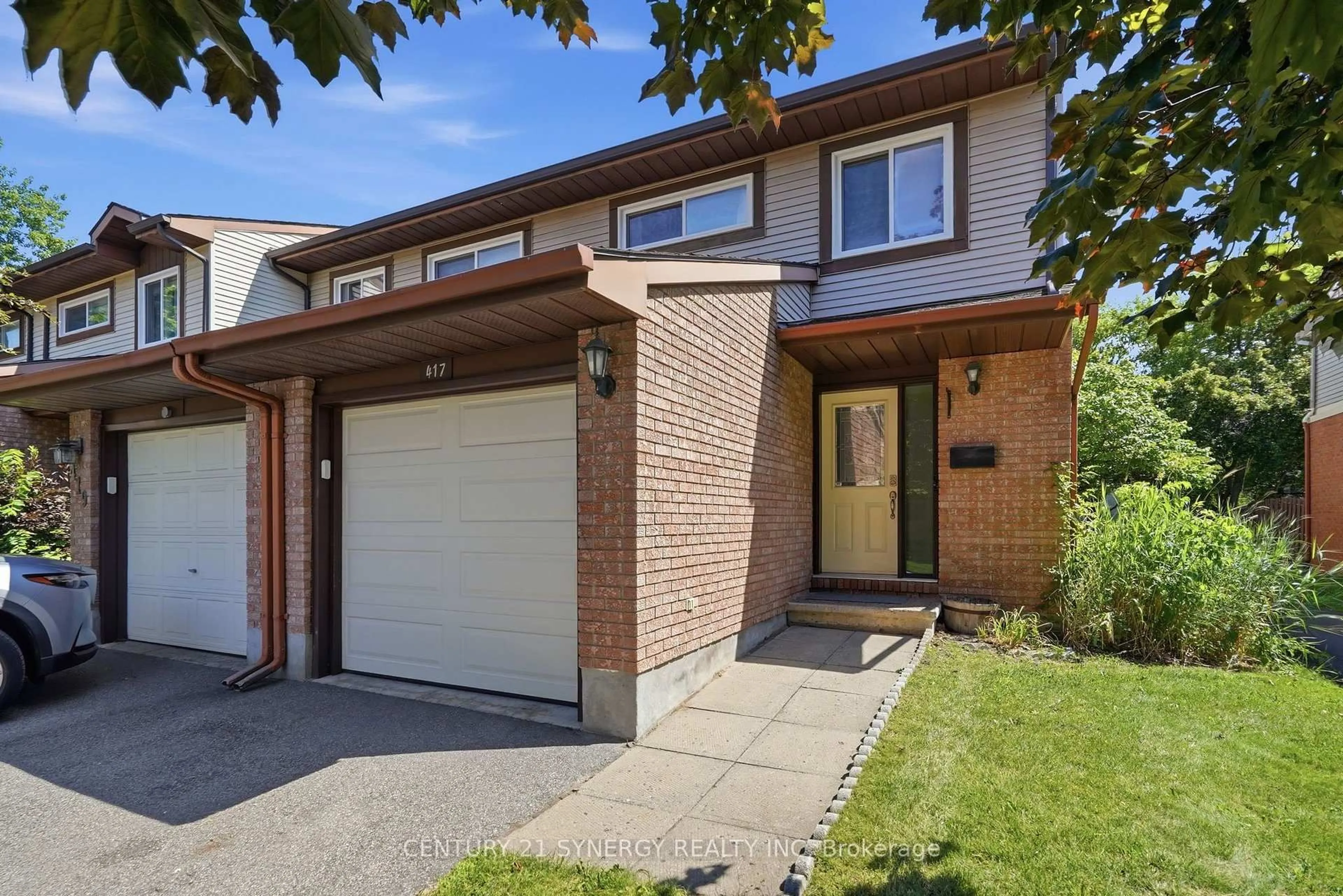Home with brick exterior material, street for 417 Sandhamn Private, Ottawa Ontario K1T 2Y9