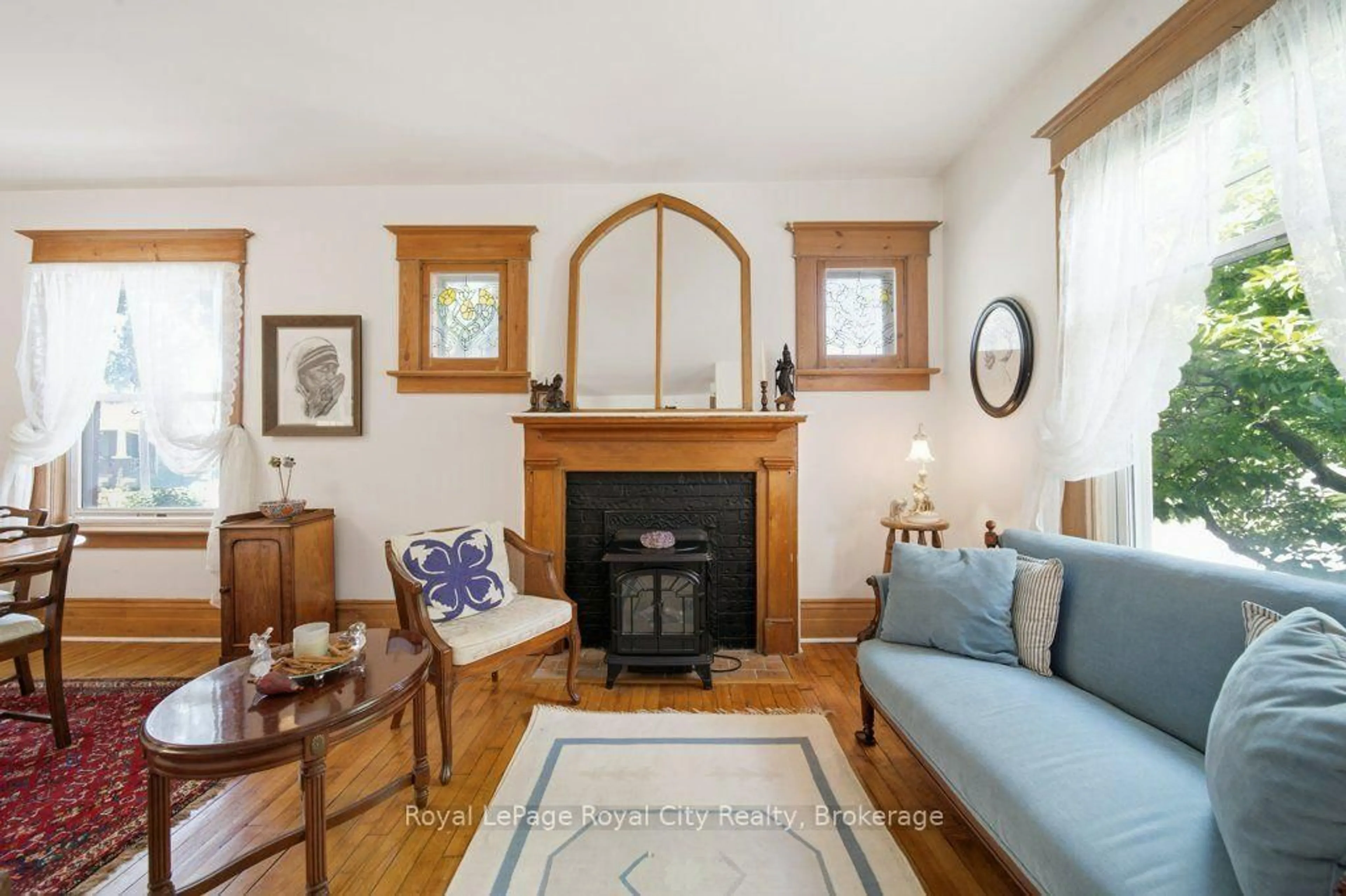 Living room with furniture, wood/laminate floor for 66 Raglan St, Guelph Ontario N1H 2S6