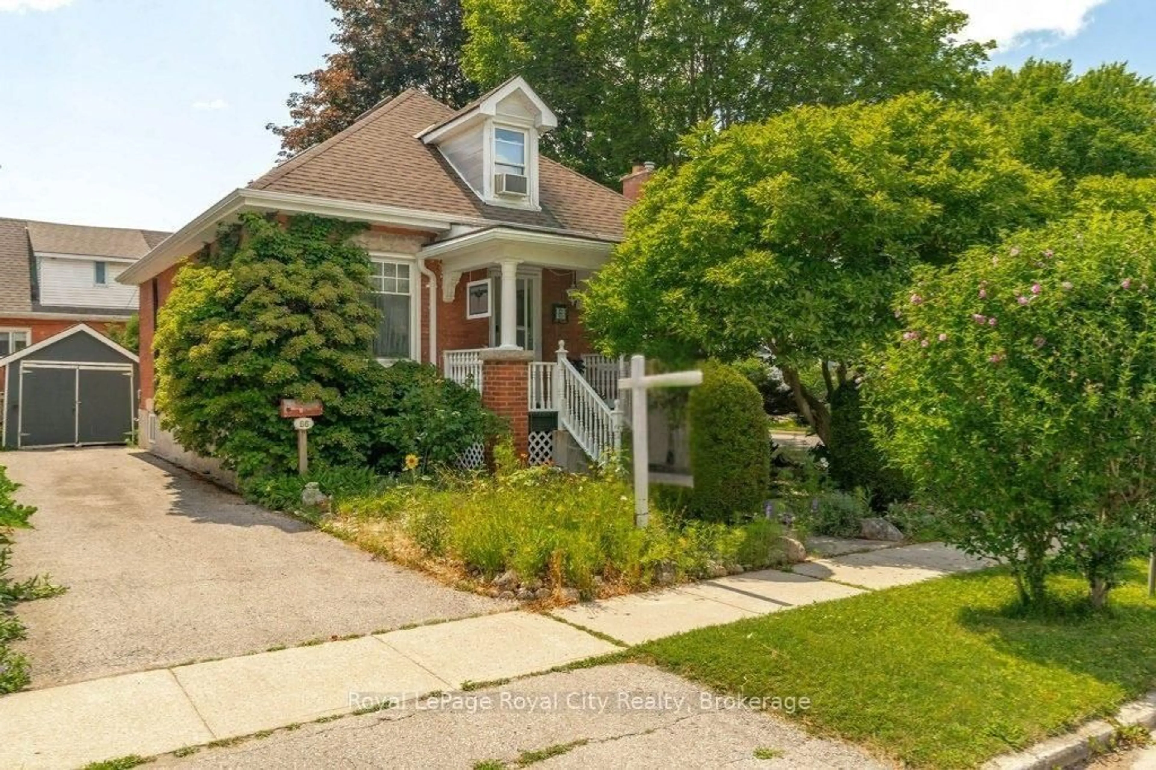 Home with brick exterior material, street for 66 Raglan St, Guelph Ontario N1H 2S6