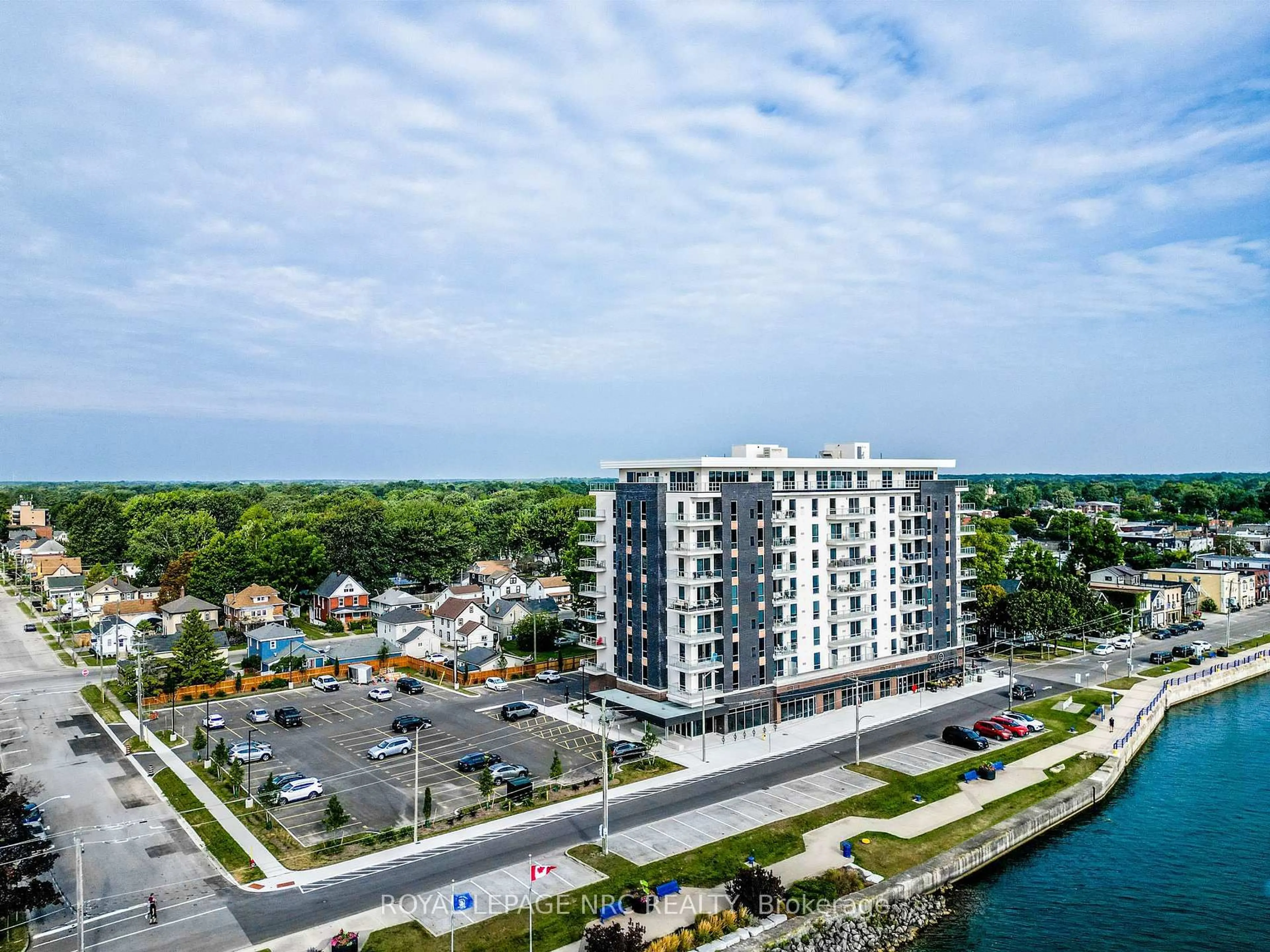 A pic from outside/outdoor area/front of a property/back of a property/a pic from drone, water/lake/river/ocean view for 118 West St #707, Port Colborne Ontario L3K 0B9