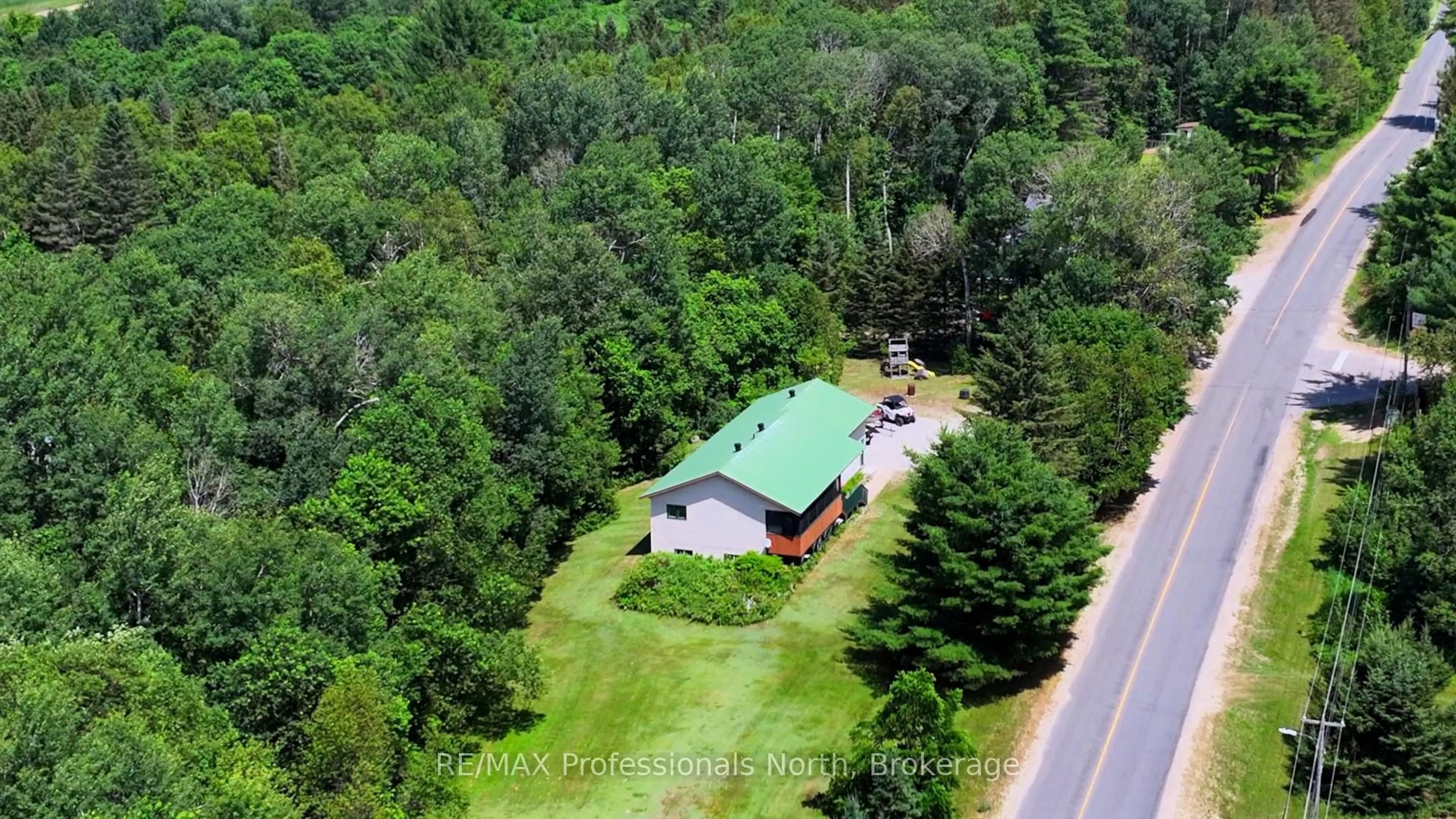 A pic from outside/outdoor area/front of a property/back of a property/a pic from drone, unknown for 66 Rain Lake Rd, Kearney Ontario P0A 1M0