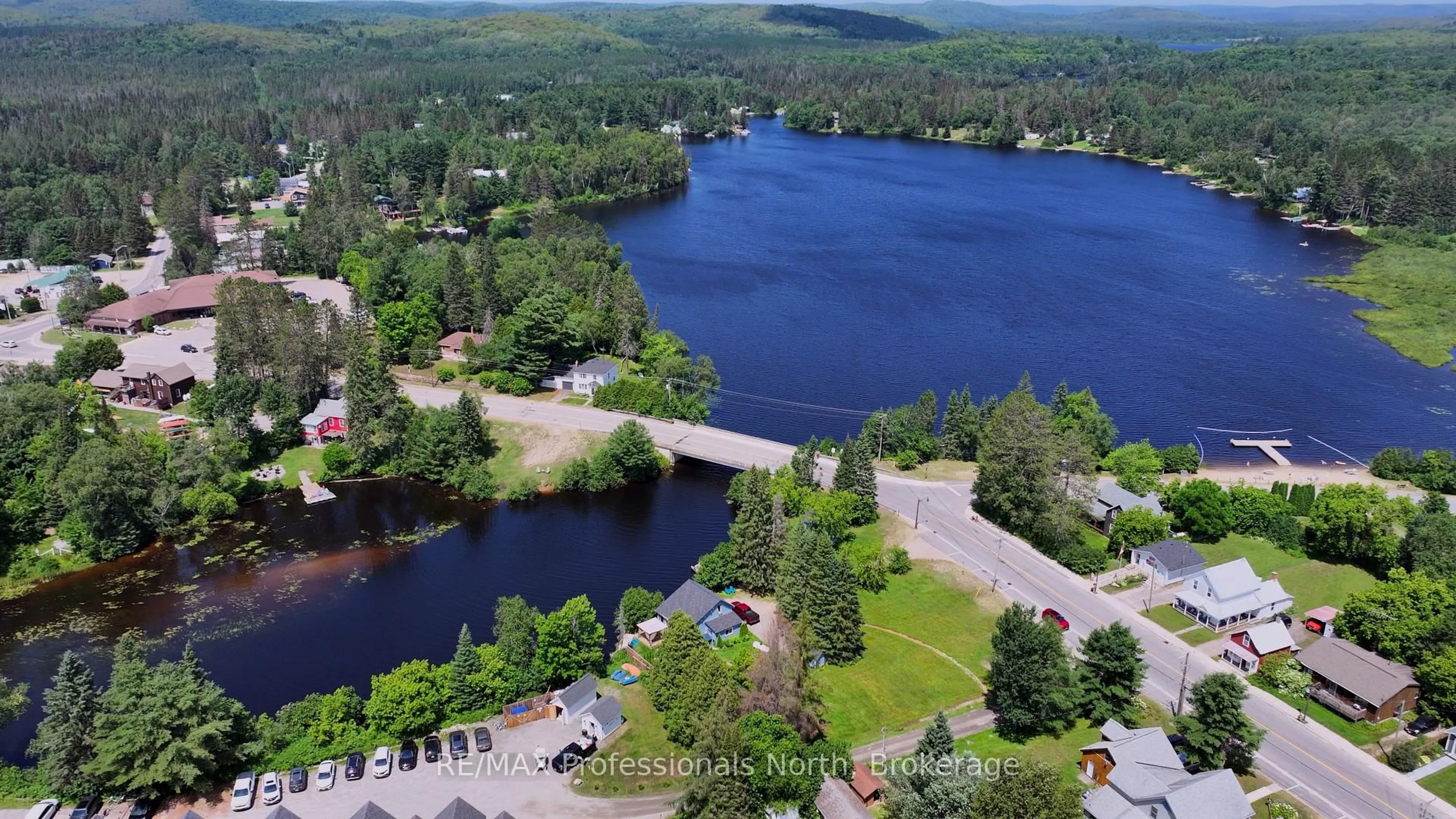 A pic from outside/outdoor area/front of a property/back of a property/a pic from drone, water/lake/river/ocean view for 66 Rain Lake Rd, Kearney Ontario P0A 1M0