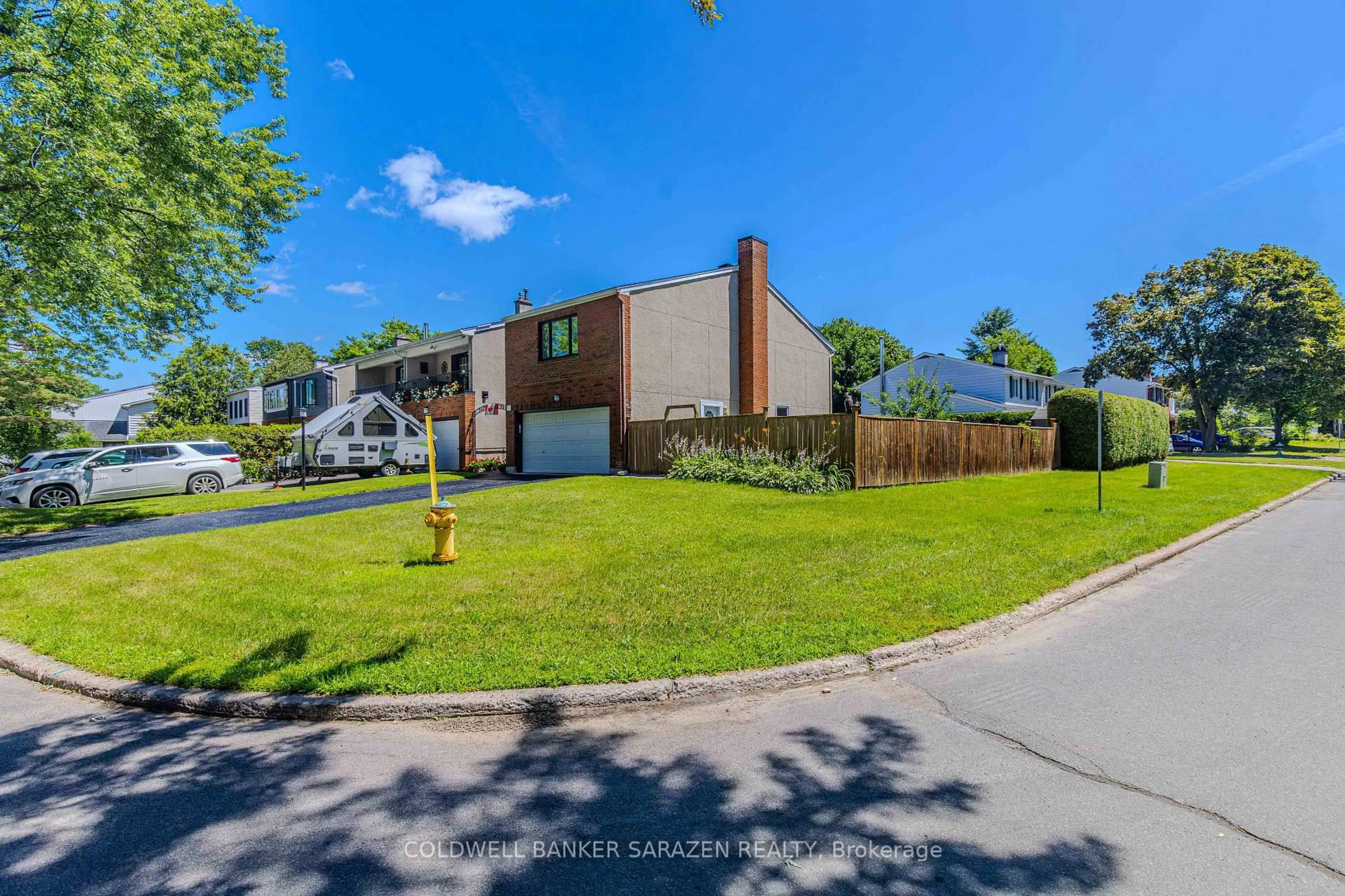A pic from outside/outdoor area/front of a property/back of a property/a pic from drone, street for 34 Hobart Cres, Ottawa Ontario K2H 5S4