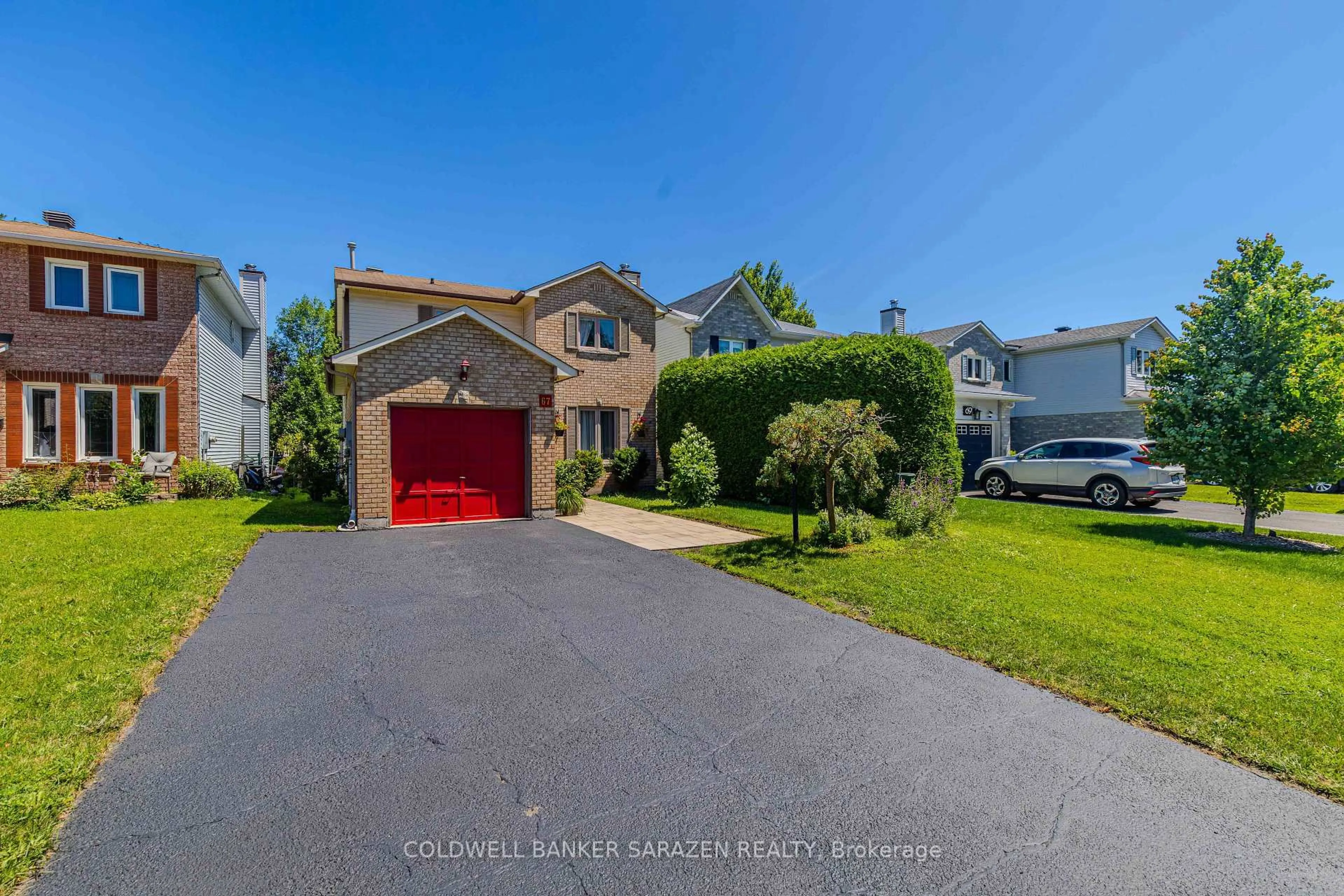 A pic from outside/outdoor area/front of a property/back of a property/a pic from drone, street for 67 Victor St, Stittsville Ontario K2S 1H8