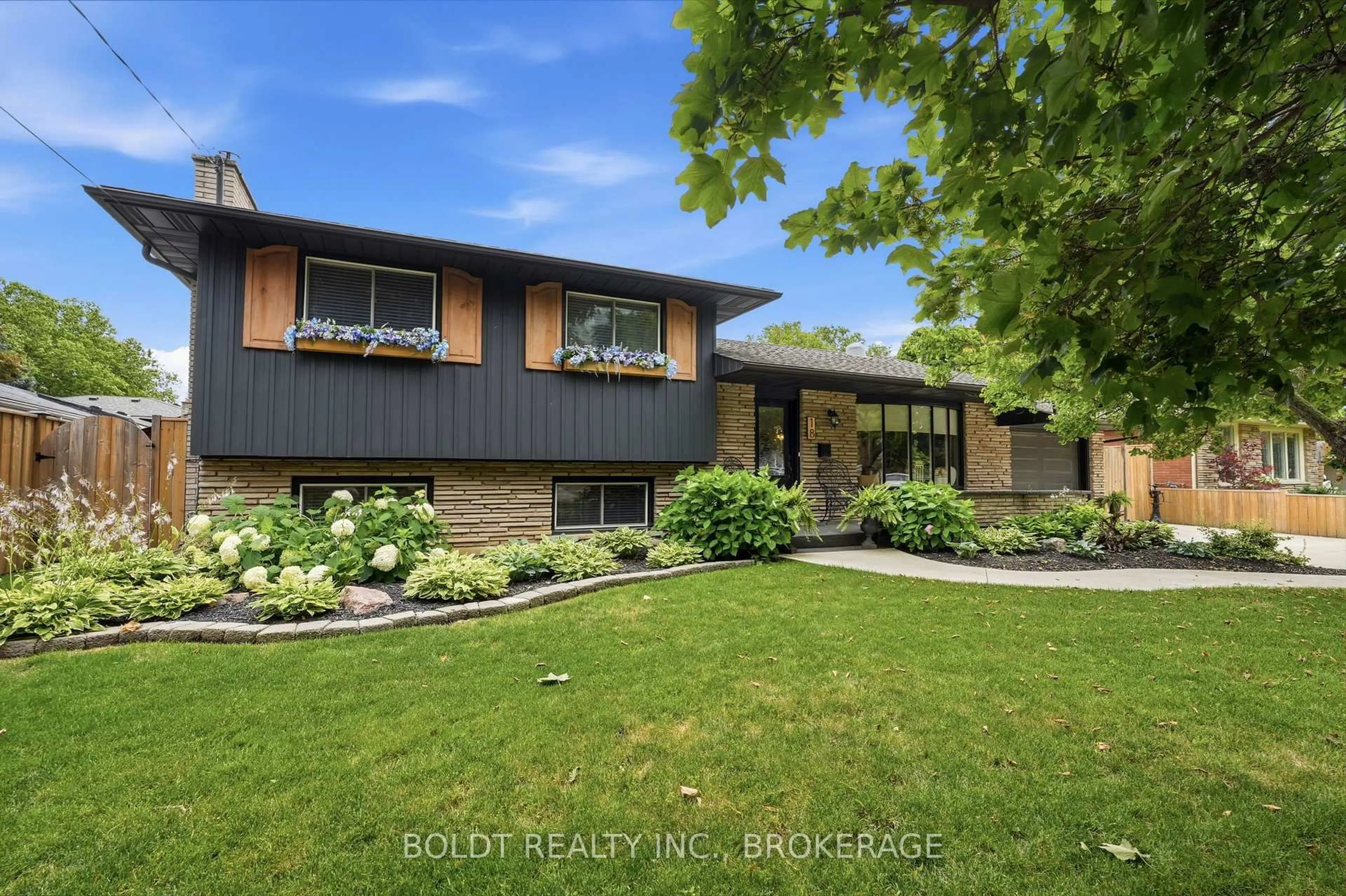 Home with brick exterior material, street for 18 Prince Charles Dr, St. Catharines Ontario L2N 3Y6