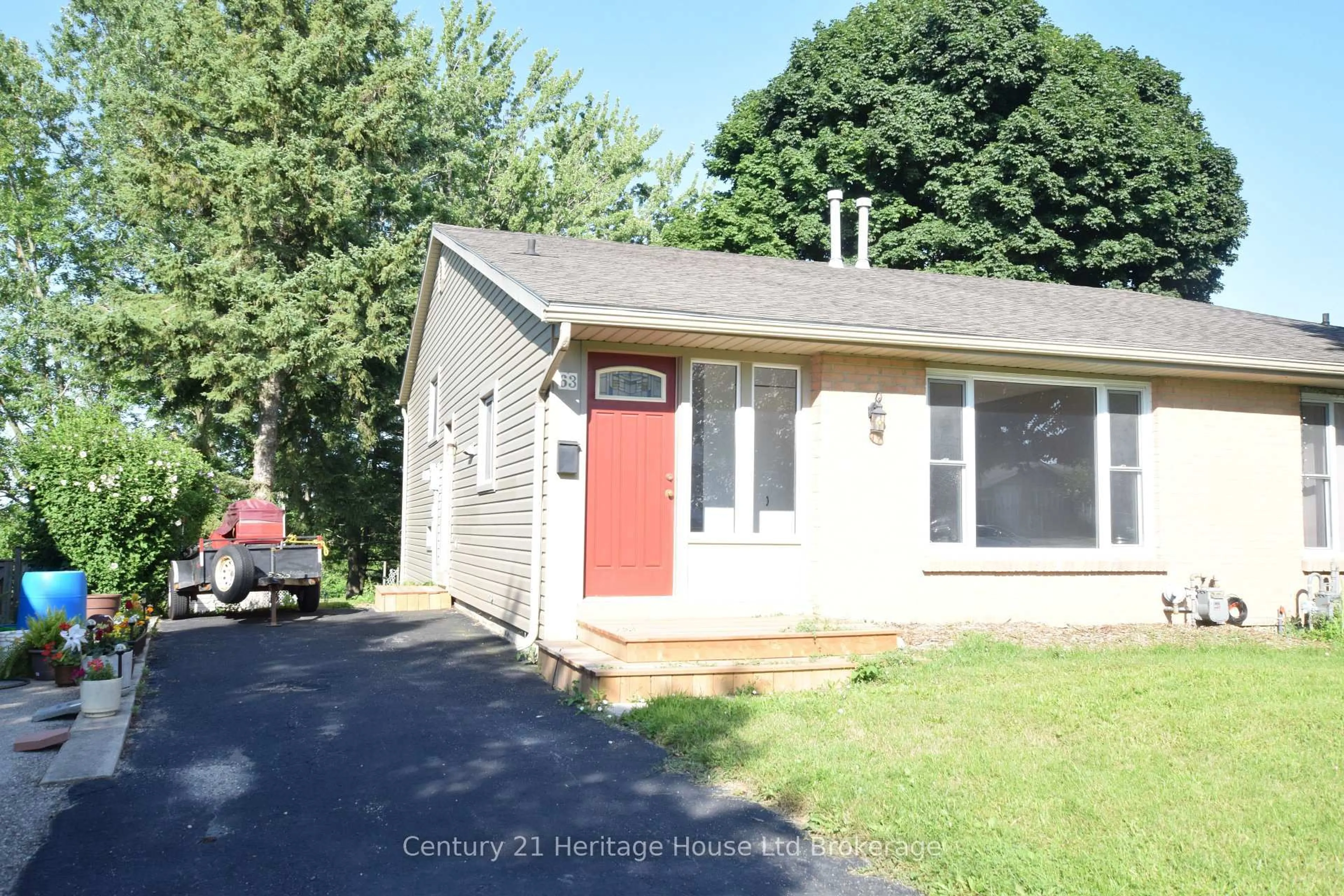 Home with vinyl exterior material, street for 63 Tennyson St, Woodstock Ontario N4S 8B3