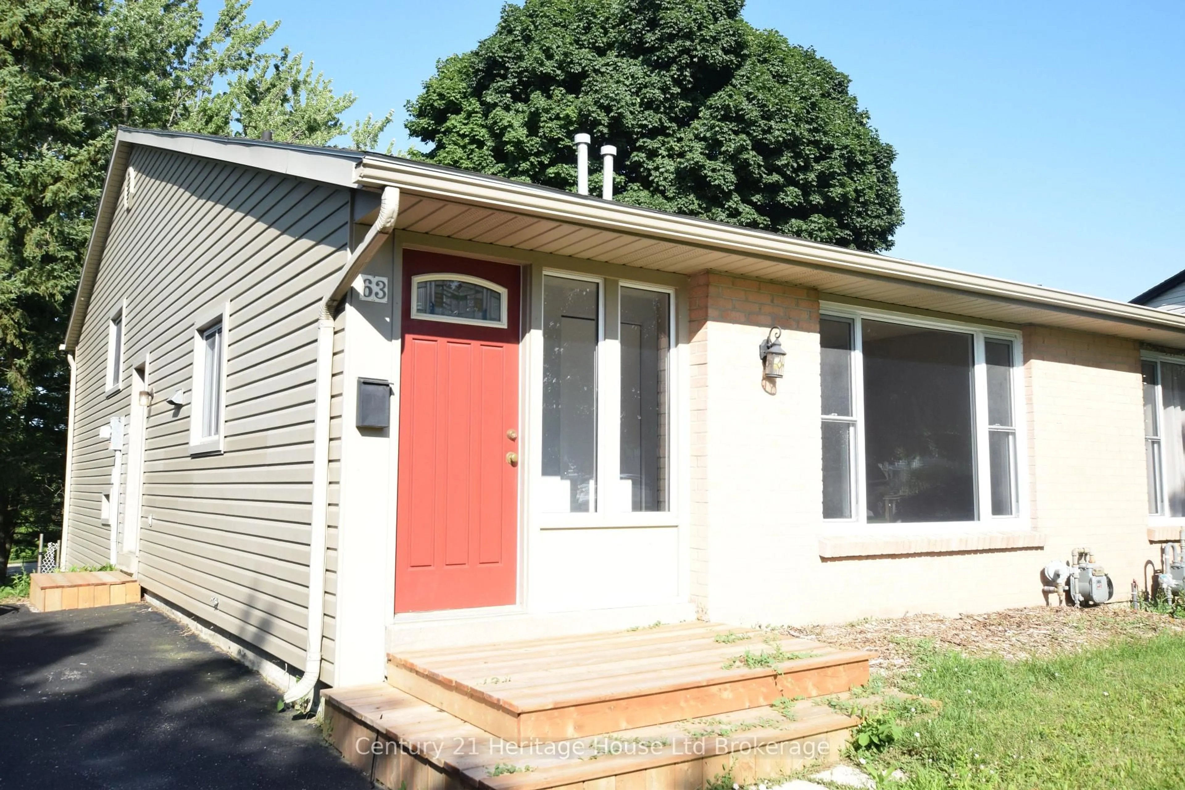 Home with vinyl exterior material, street for 63 Tennyson St, Woodstock Ontario N4S 8B3