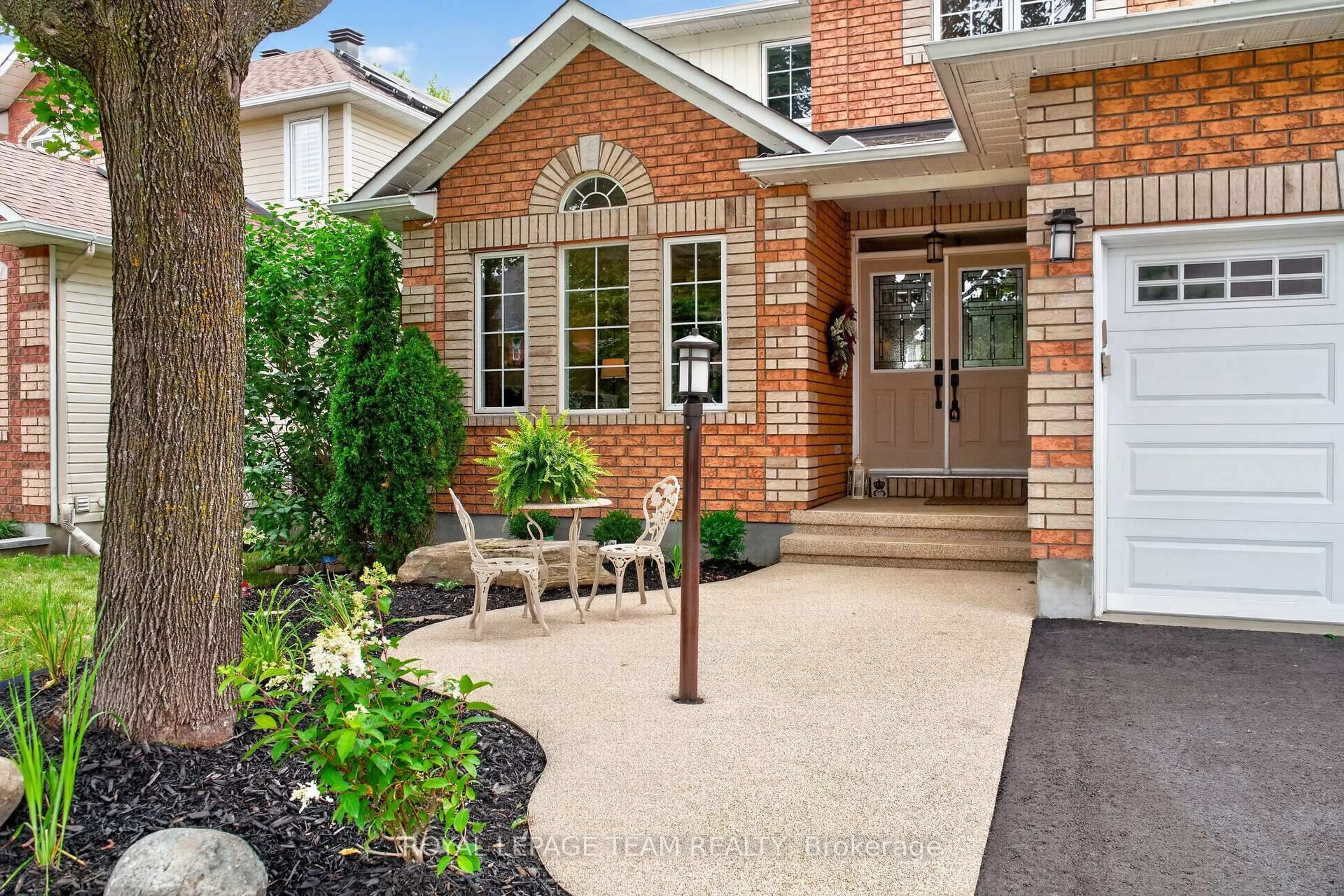 Home with brick exterior material, street for 12 Forillon Cres, Ottawa Ontario K2M 2W5