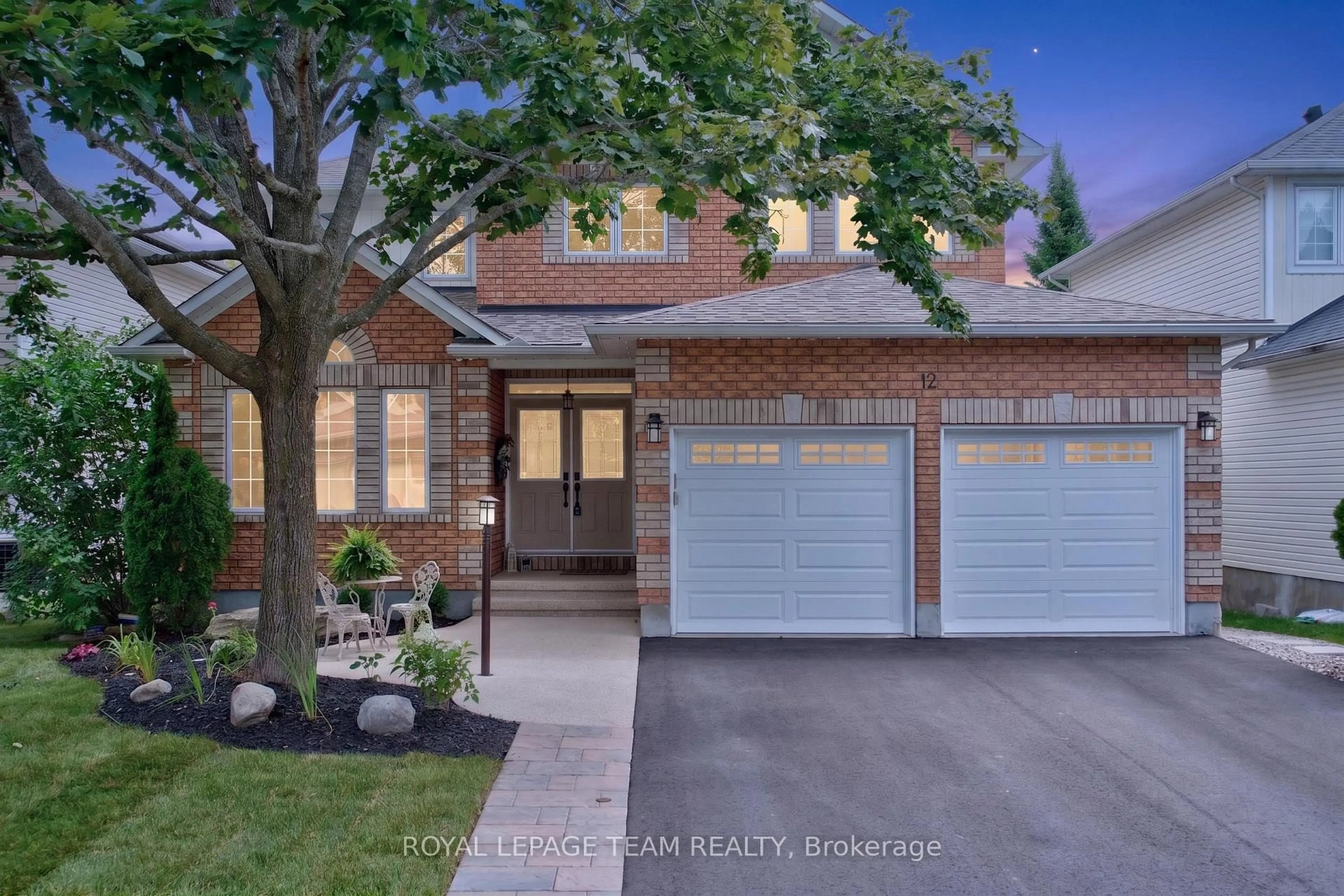 Home with brick exterior material, street for 12 Forillon Cres, Ottawa Ontario K2M 2W5