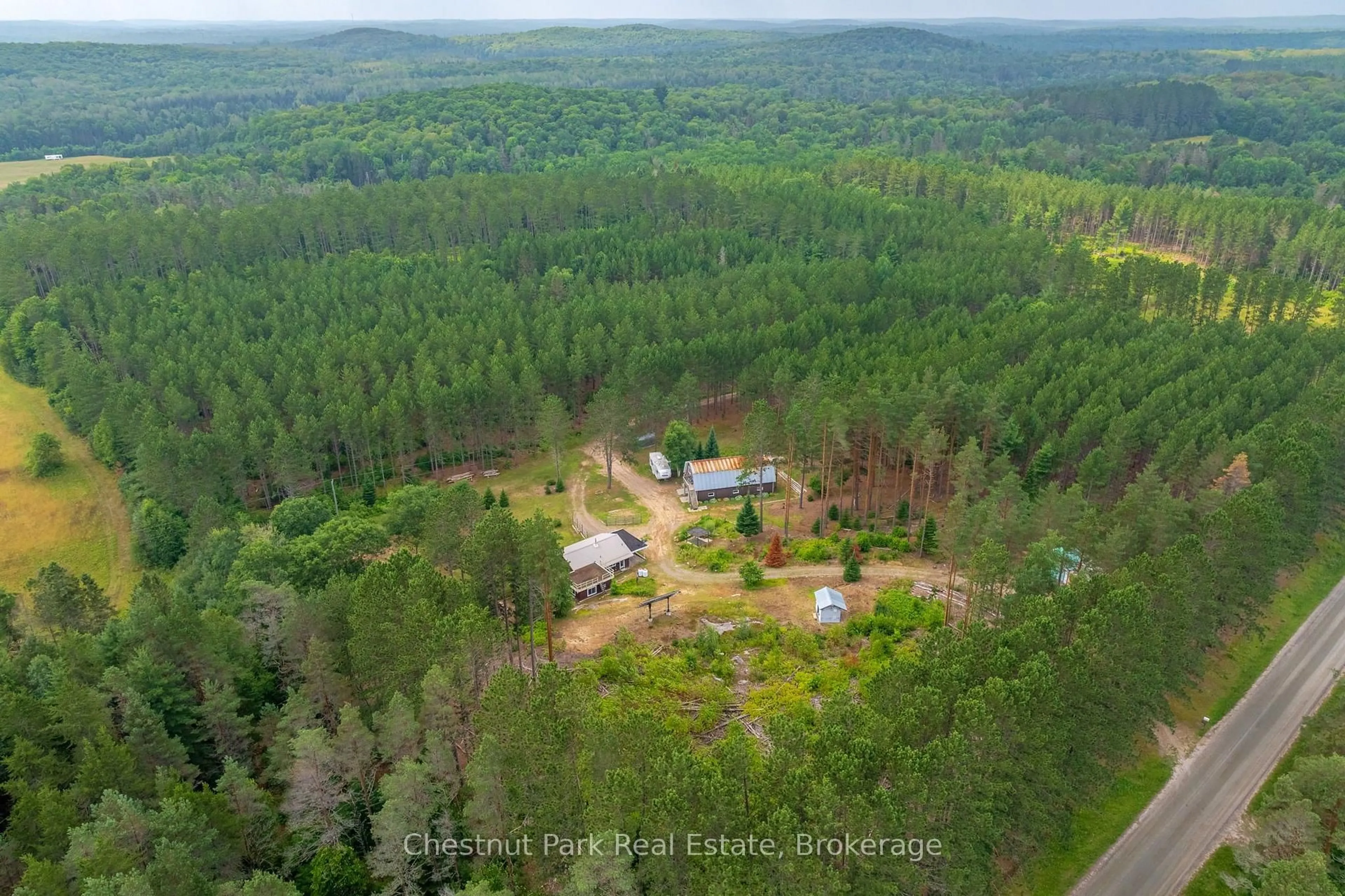 A pic from outside/outdoor area/front of a property/back of a property/a pic from drone, forest/trees view for 165 James Camp Rd, Ryerson Ontario P0A 1C0