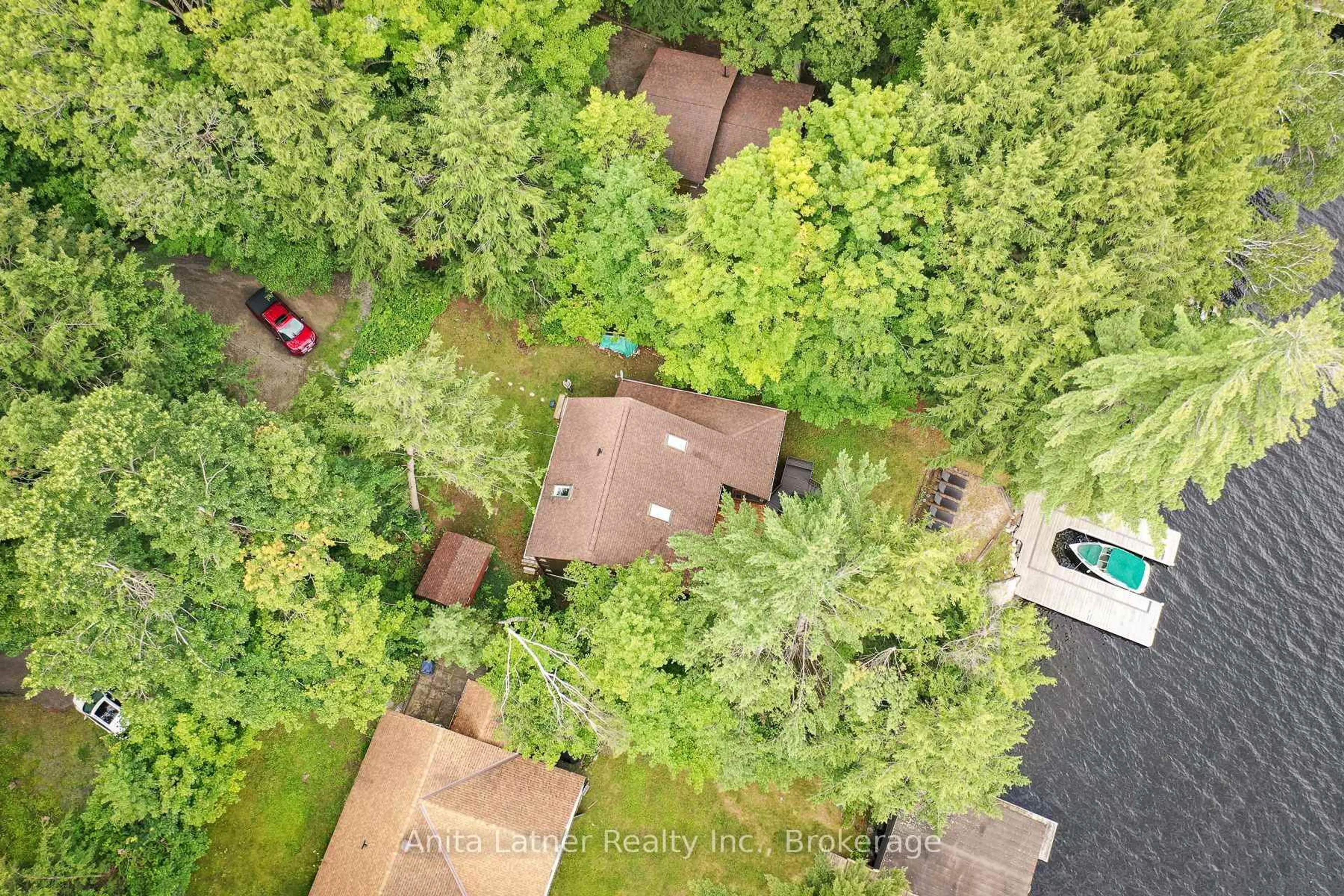 A pic from outside/outdoor area/front of a property/back of a property/a pic from drone, forest/trees view for 1008 Eppy (Formerly Division Road) Lane, Gravenhurst Ontario P1P 1R2