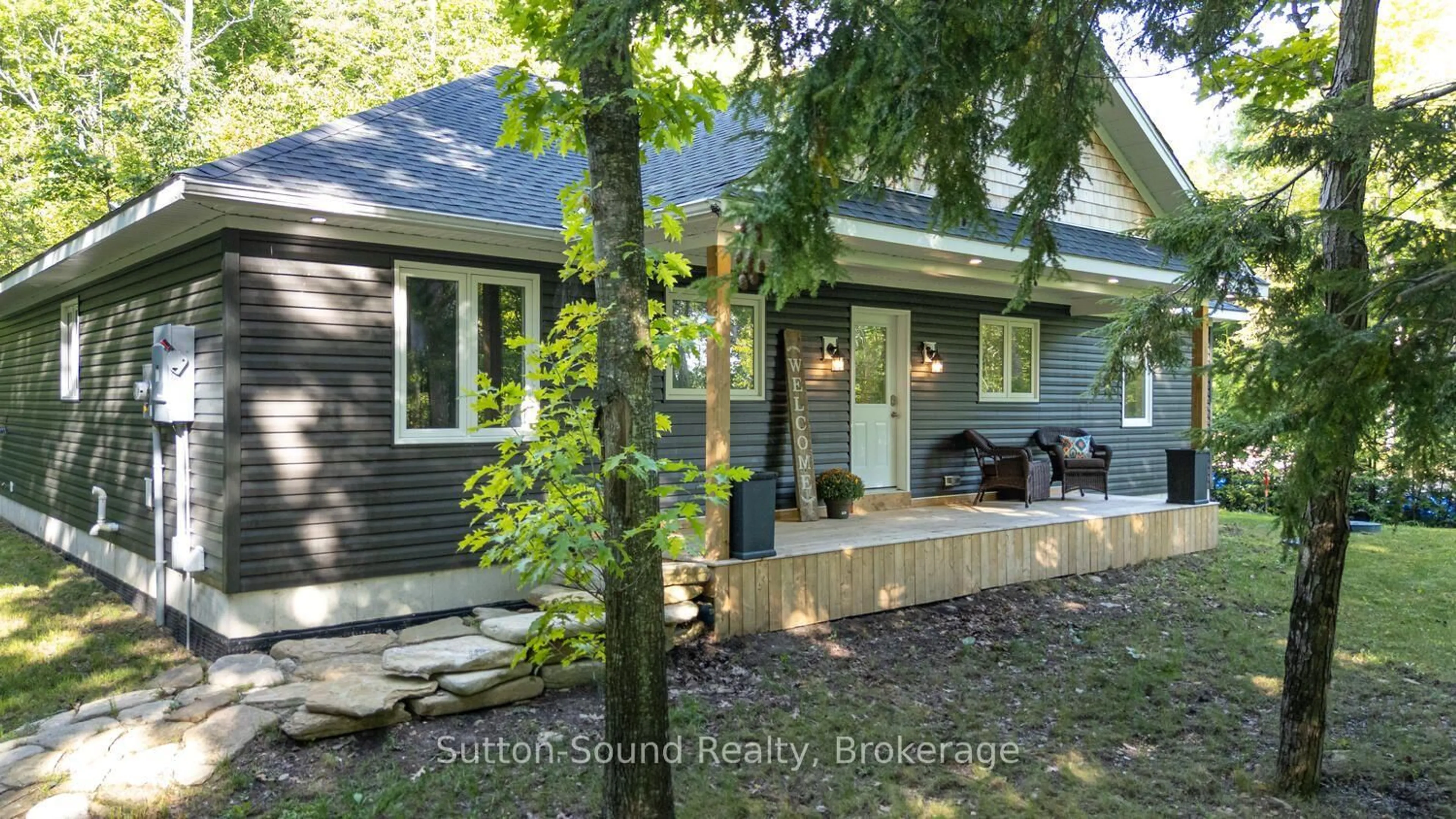 Home with vinyl exterior material, street for 504760 Grey Road 1, Georgian Bluffs Ontario N0H 1S0
