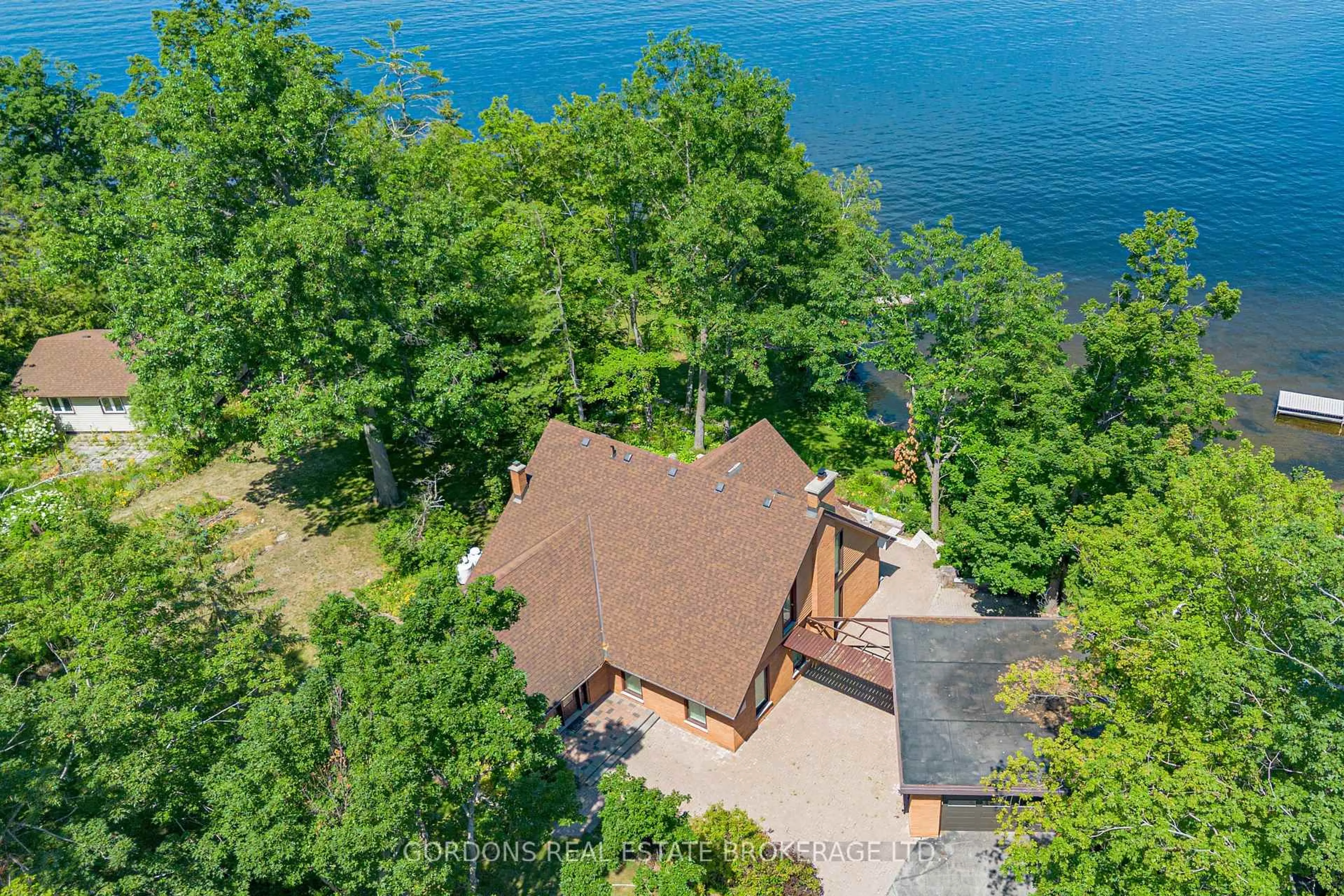 A pic from outside/outdoor area/front of a property/back of a property/a pic from drone, water/lake/river/ocean view for 22 Sugarbush Tr, Kawartha Lakes Ontario K0M 1N0