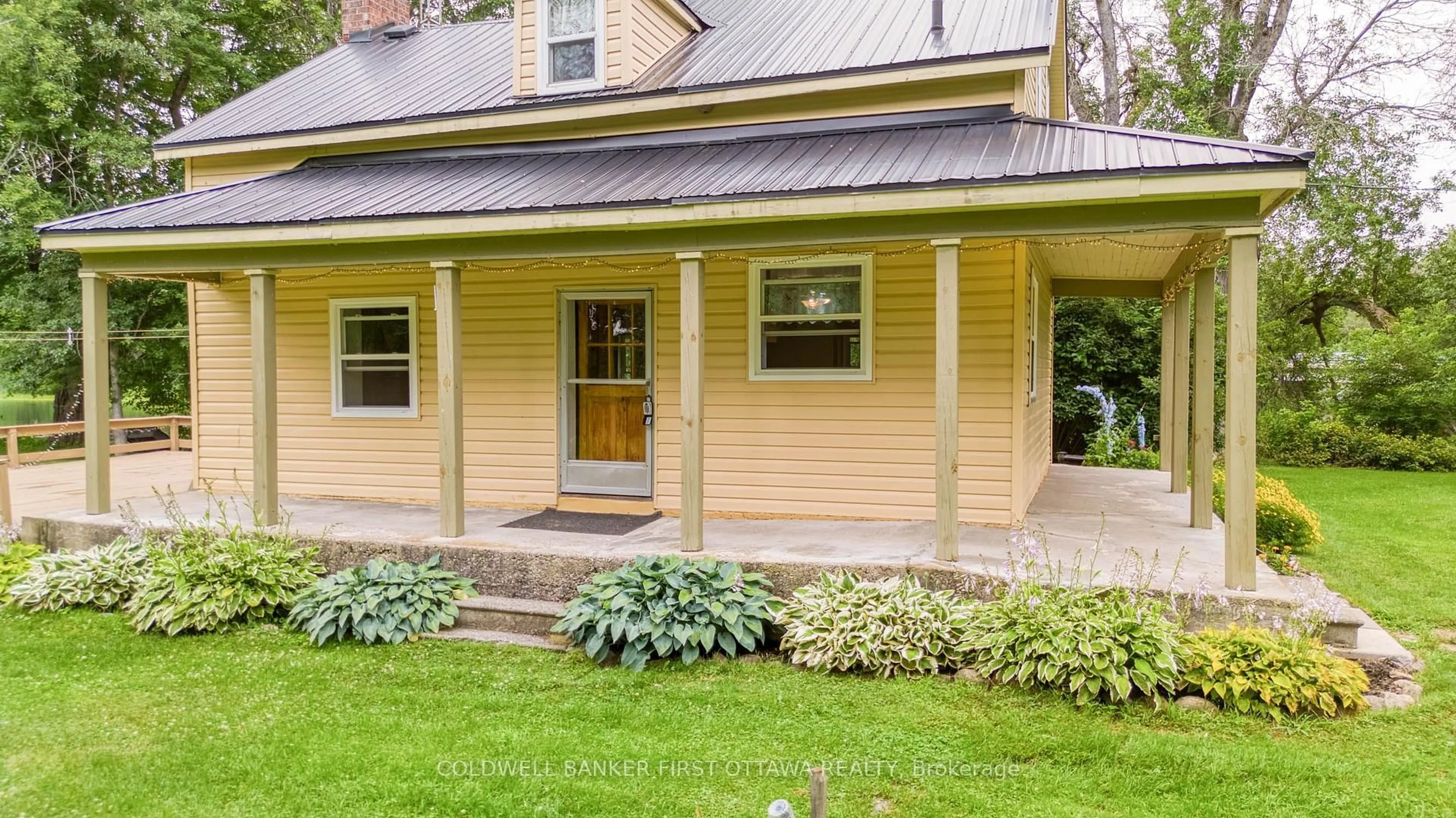 Home with vinyl exterior material, street for 1330 Ferguson Falls Rd, Lanark Ontario K0G 1K0