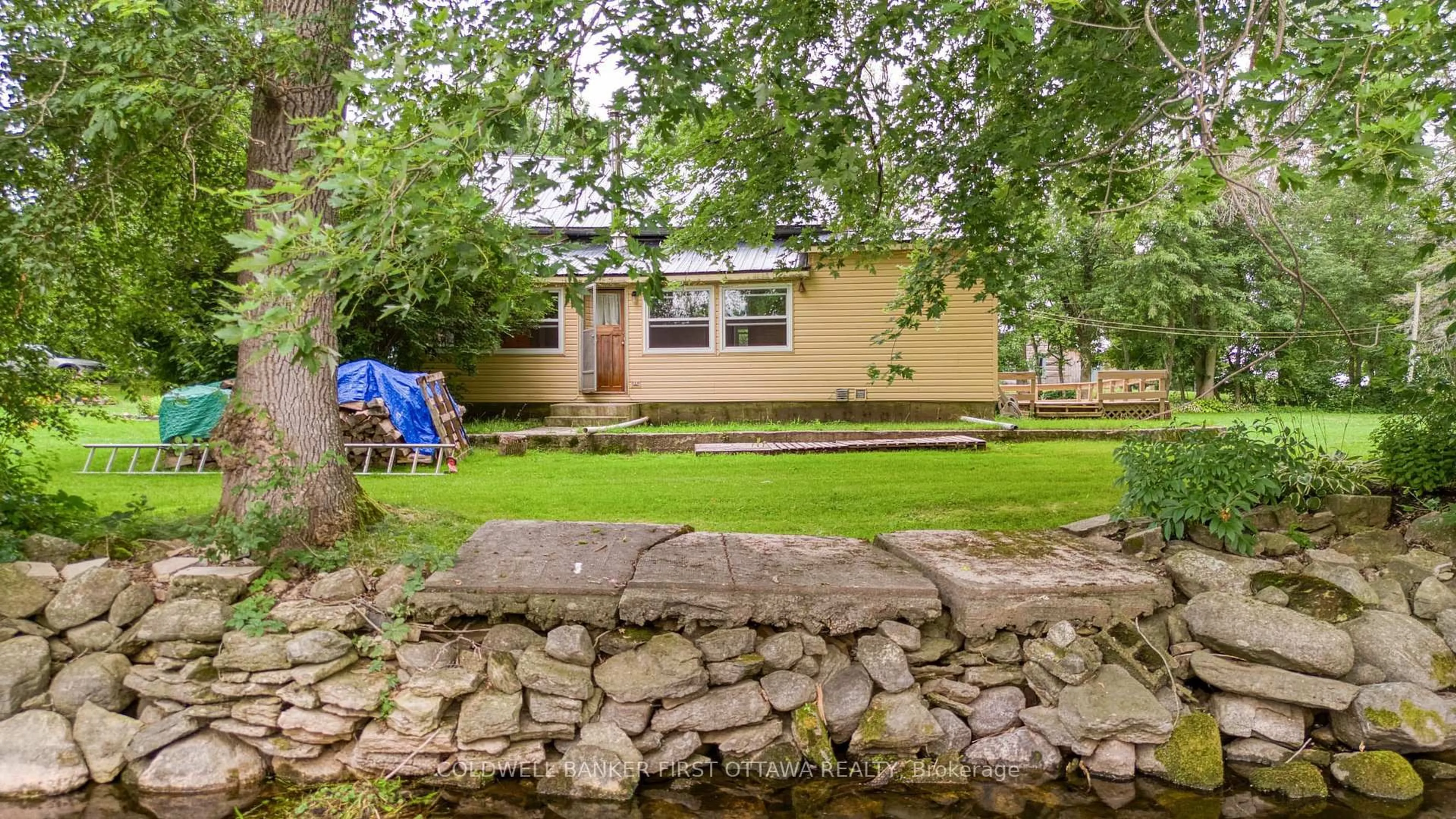 A pic from outside/outdoor area/front of a property/back of a property/a pic from drone, street for 1330 Ferguson Falls Rd, Lanark Ontario K0G 1K0