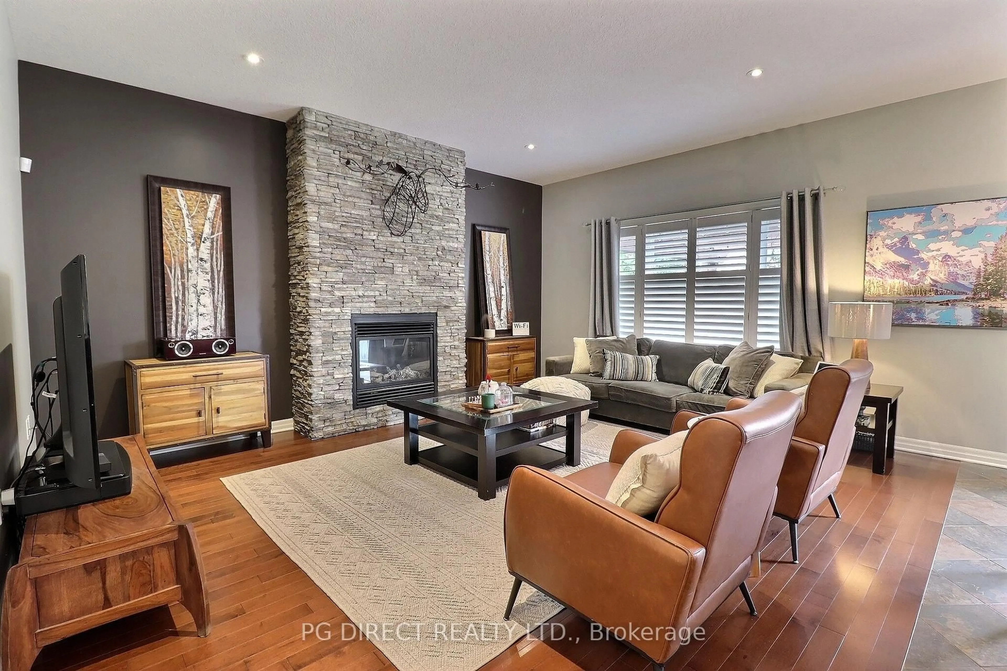 Living room with furniture, wood/laminate floor for 3089 Pomeroy Lane, London South Ontario N6P 0B6
