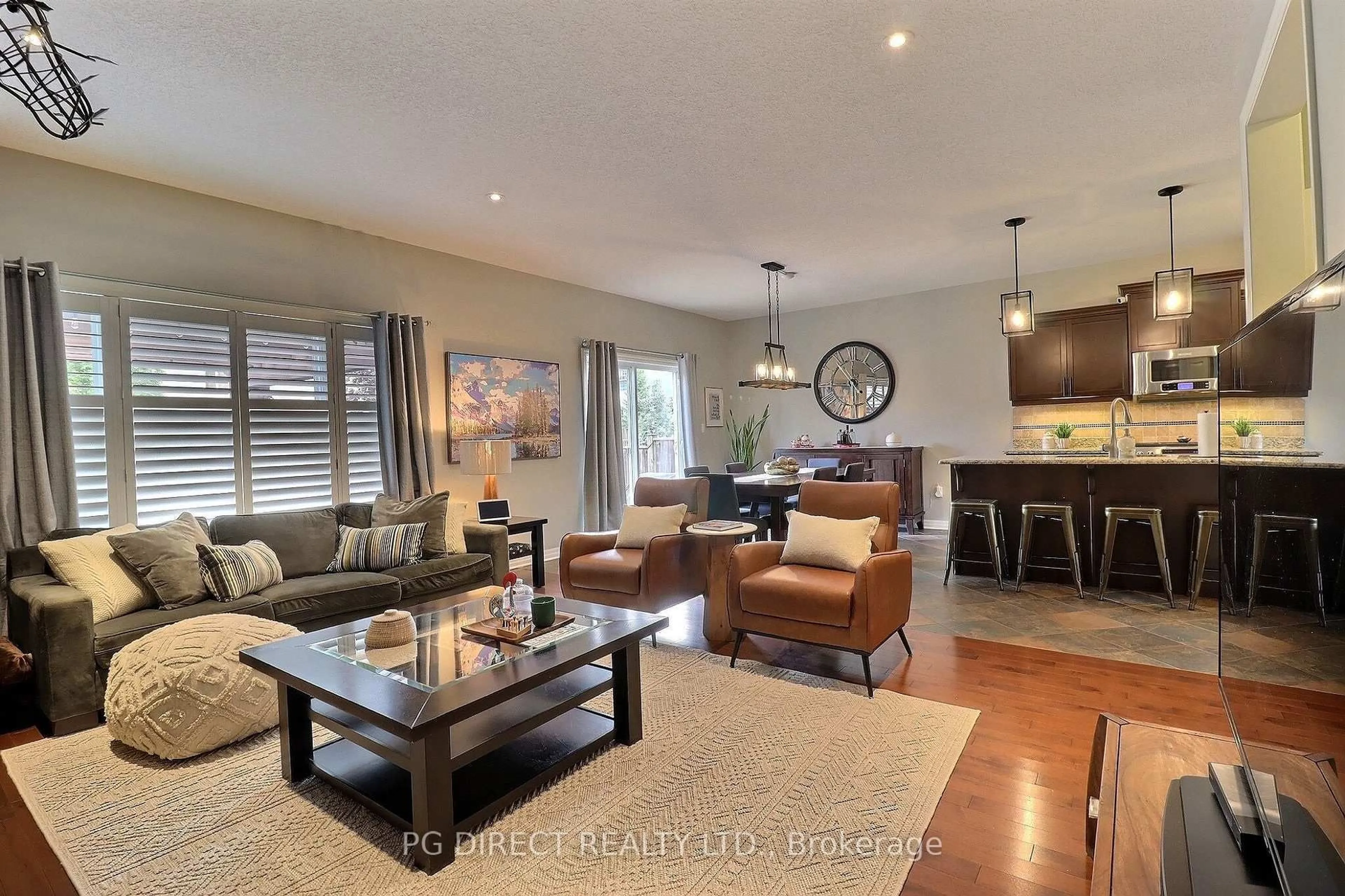 Living room with furniture, wood/laminate floor for 3089 Pomeroy Lane, London South Ontario N6P 0B6