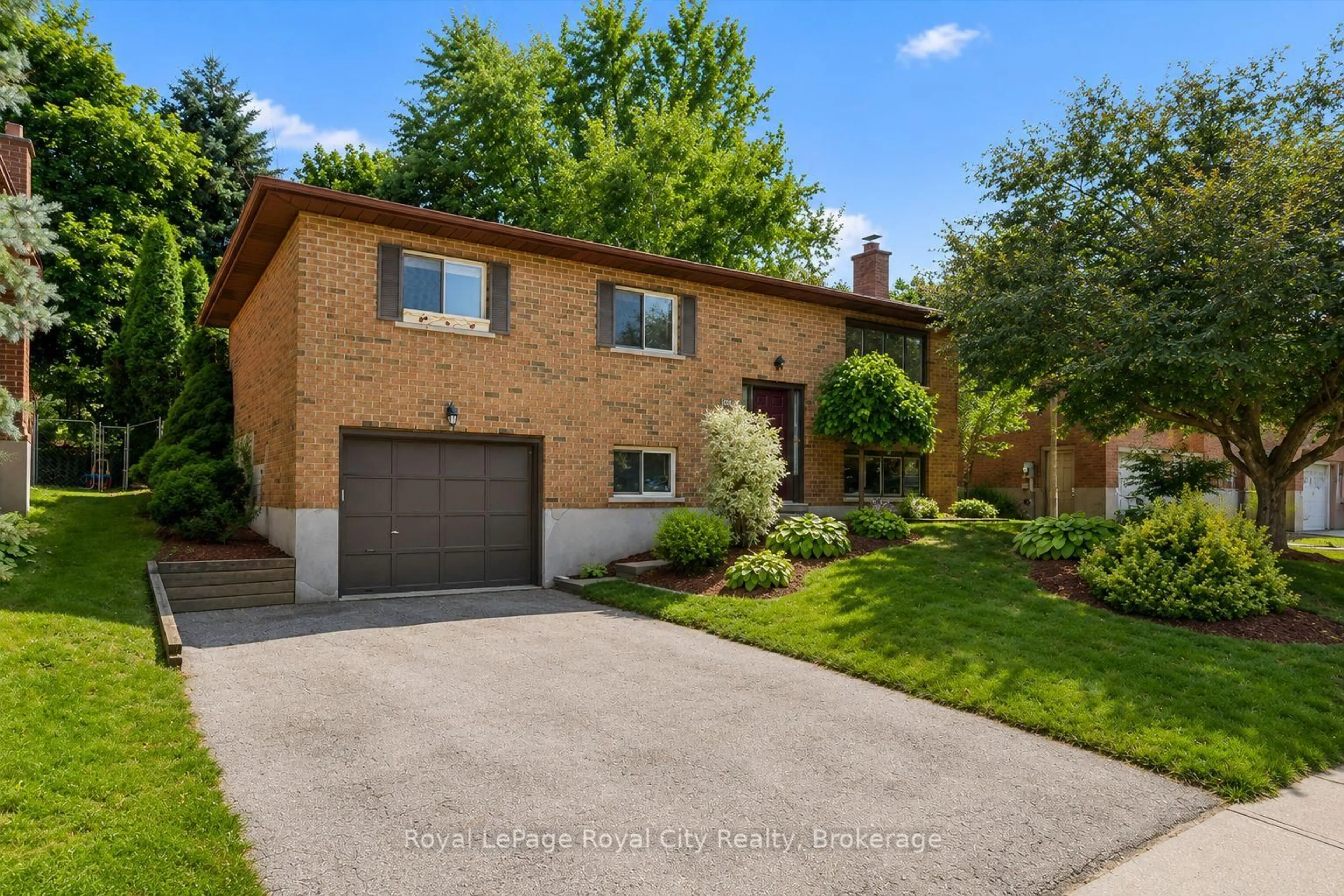 Home with brick exterior material, street for 181 Harvard Rd, Guelph Ontario N1G 4K4