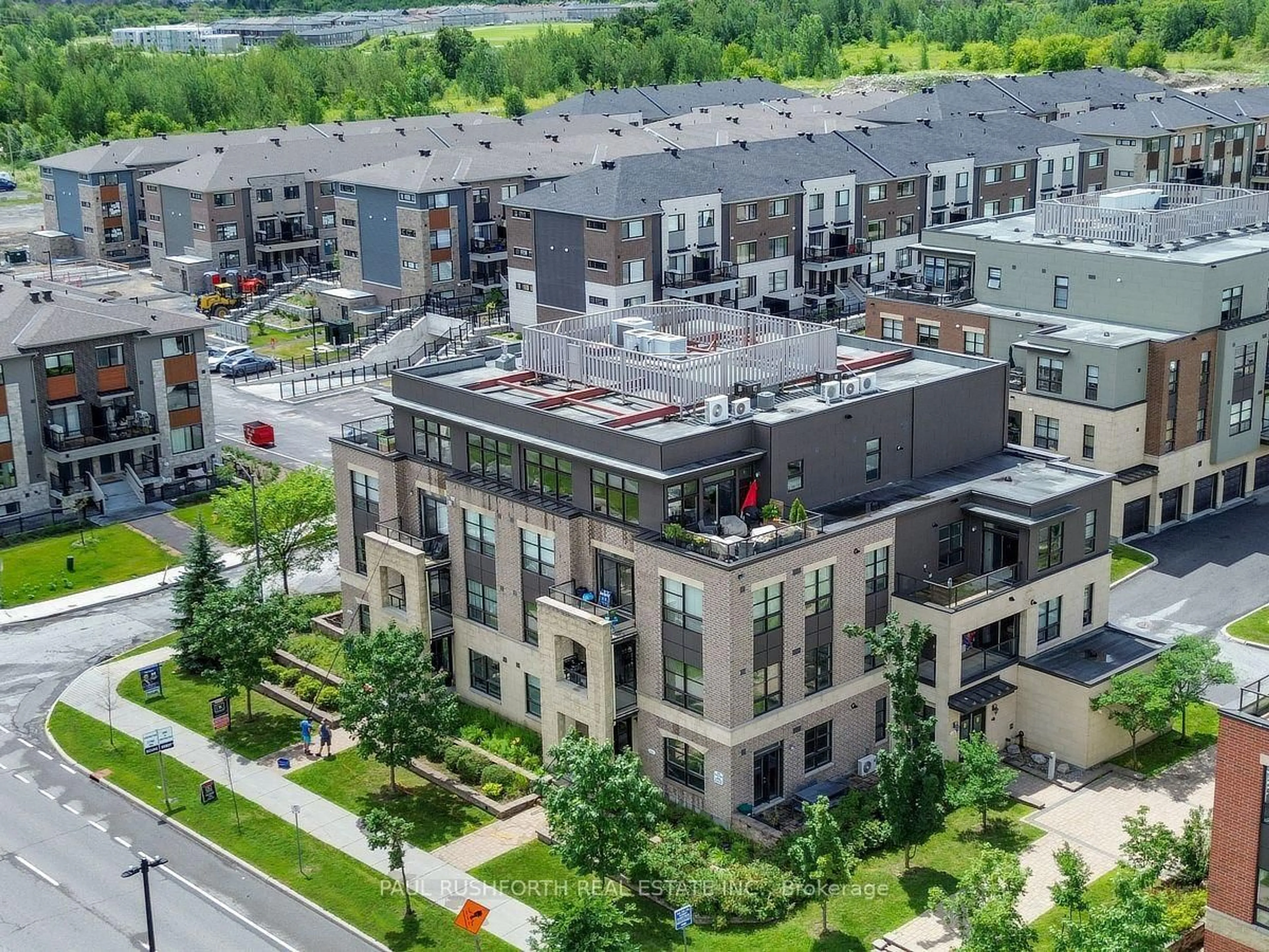 A pic from outside/outdoor area/front of a property/back of a property/a pic from drone, city buildings view from balcony for 200 Glenroy Gilbert Dr #304, Ottawa Ontario K2J 5W2