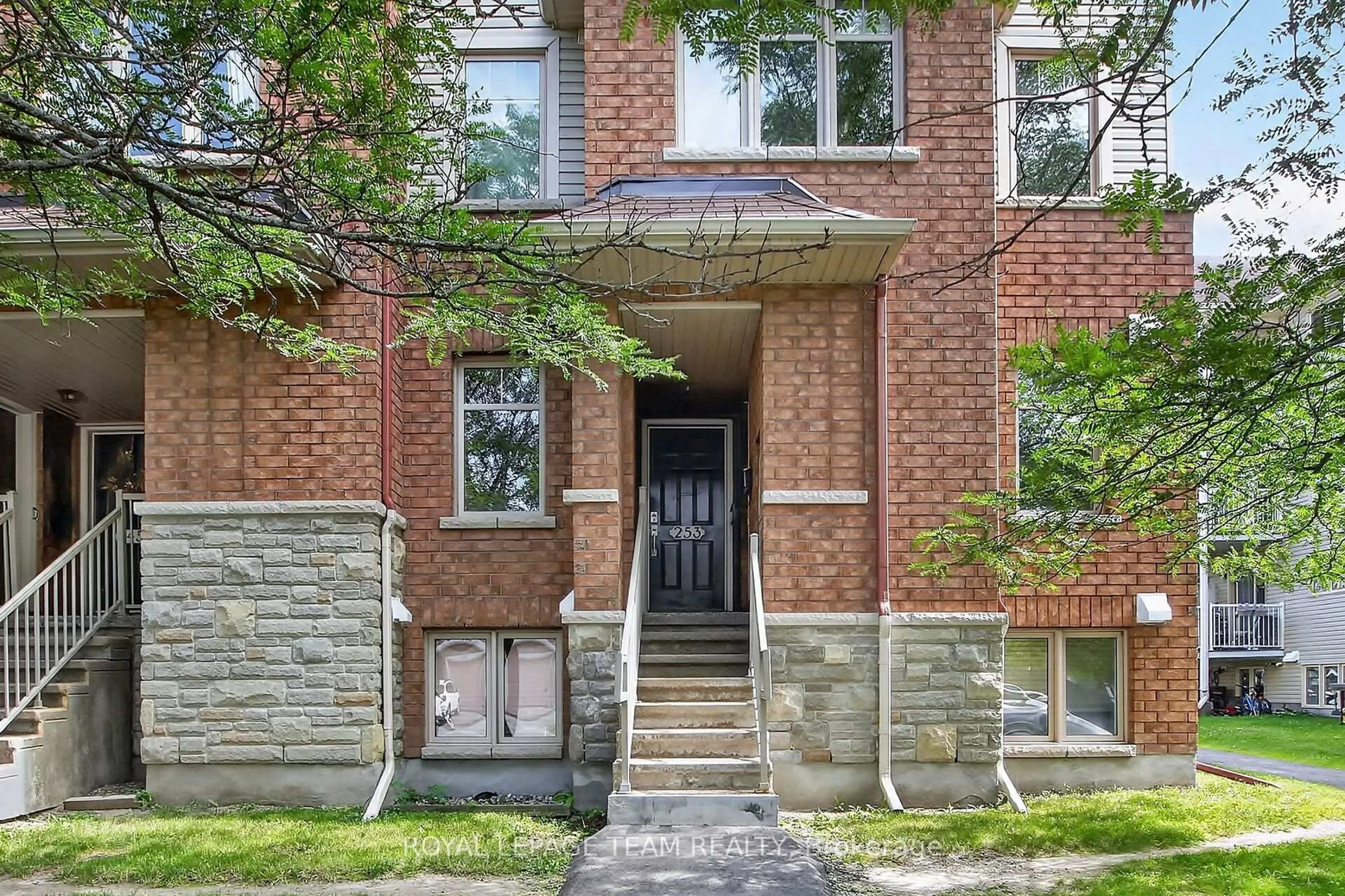 Home with brick exterior material, street for 255 Deercroft Ave, Ottawa Ontario K2J 5J9