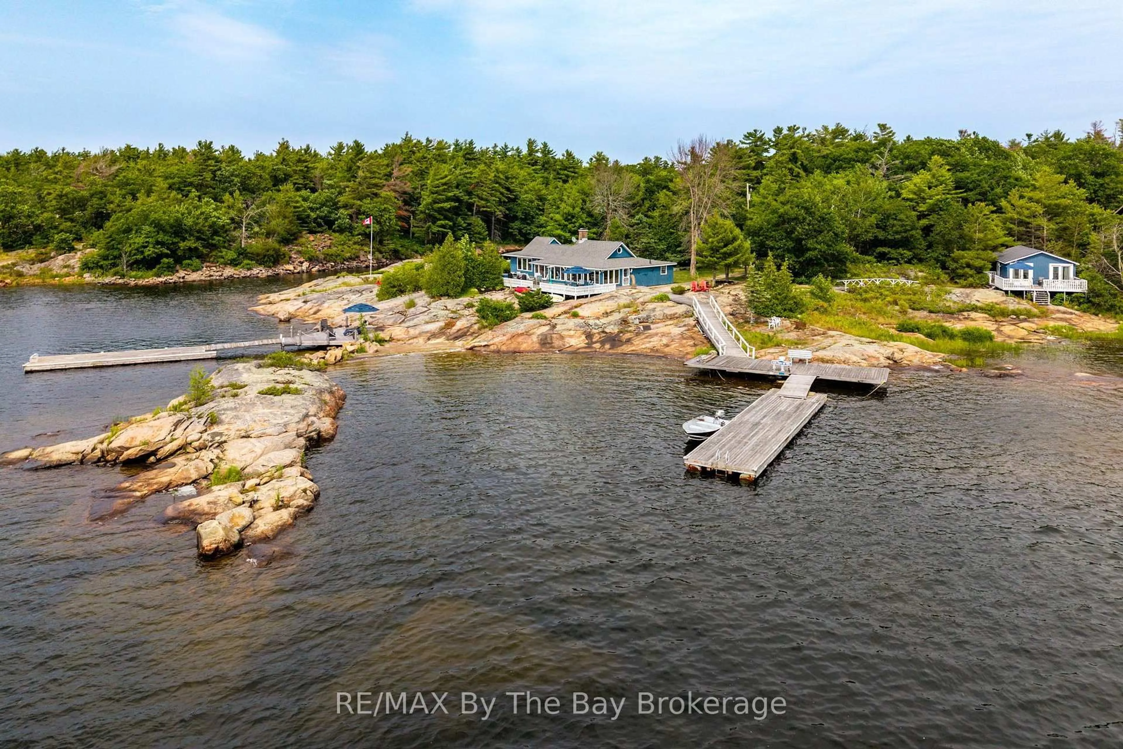 A pic from outside/outdoor area/front of a property/back of a property/a pic from drone, water/lake/river/ocean view for 6686 Island 1040/Little Beausoleil Island, Georgian Bay Ontario P0E 1E0
