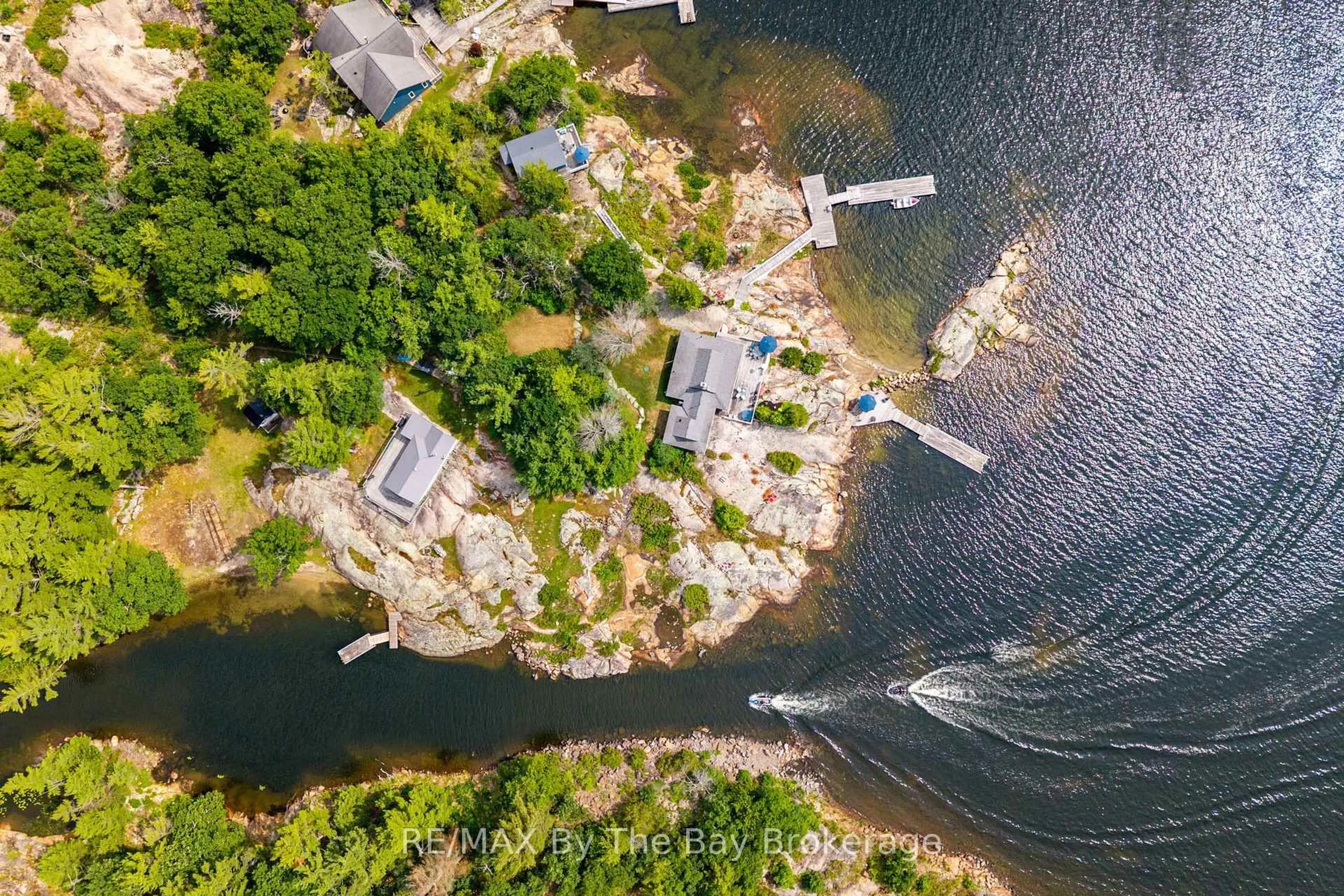 A pic from outside/outdoor area/front of a property/back of a property/a pic from drone, water/lake/river/ocean view for 6686 Island 1040/Little Beausoleil Island, Georgian Bay Ontario P0E 1E0