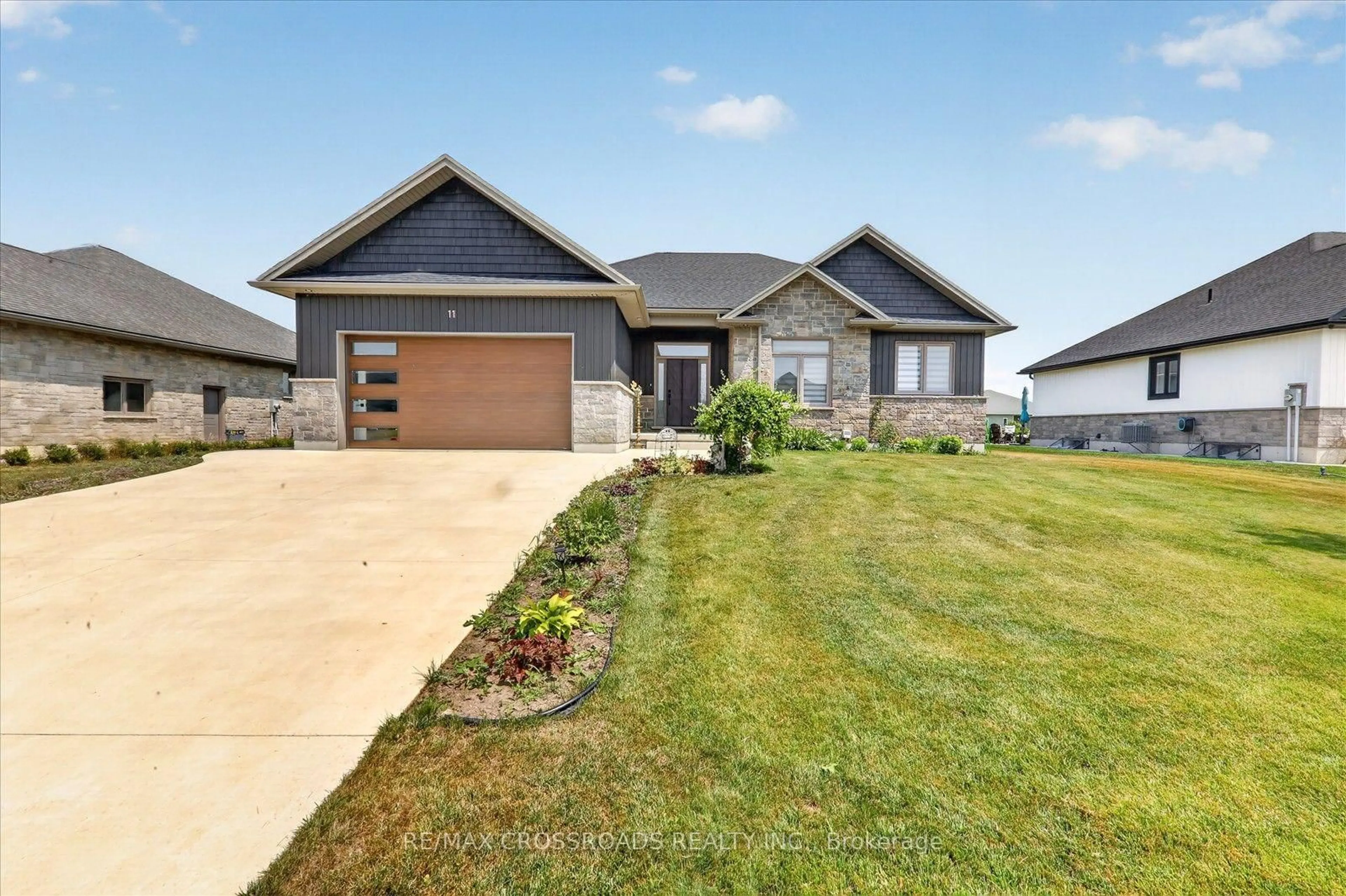 Home with brick exterior material, street for 11 MCTAVISH Cres, Huron-Kinloss Ontario N0G 2R0