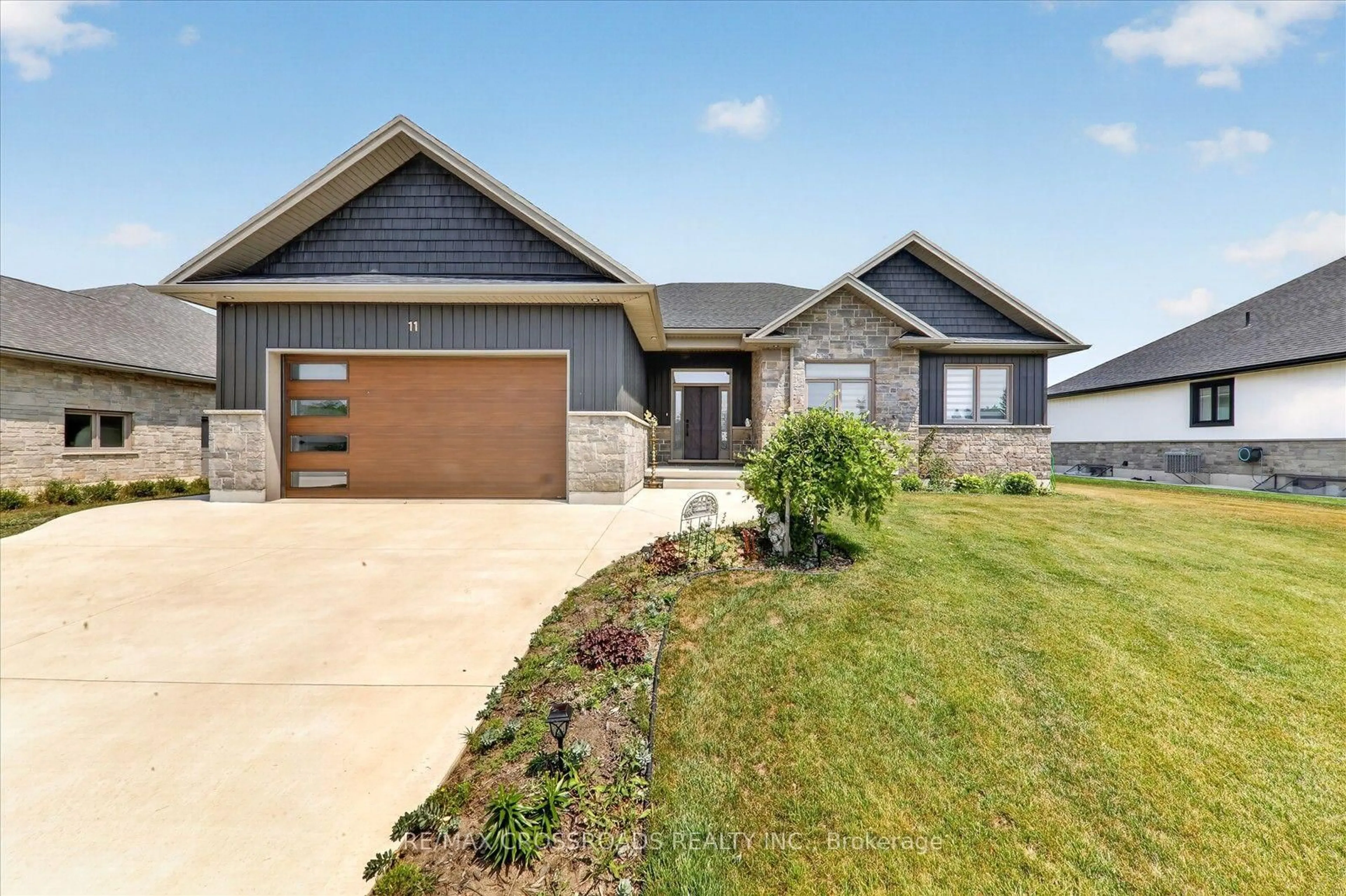 Home with brick exterior material, street for 11 MCTAVISH Cres, Huron-Kinloss Ontario N0G 2R0