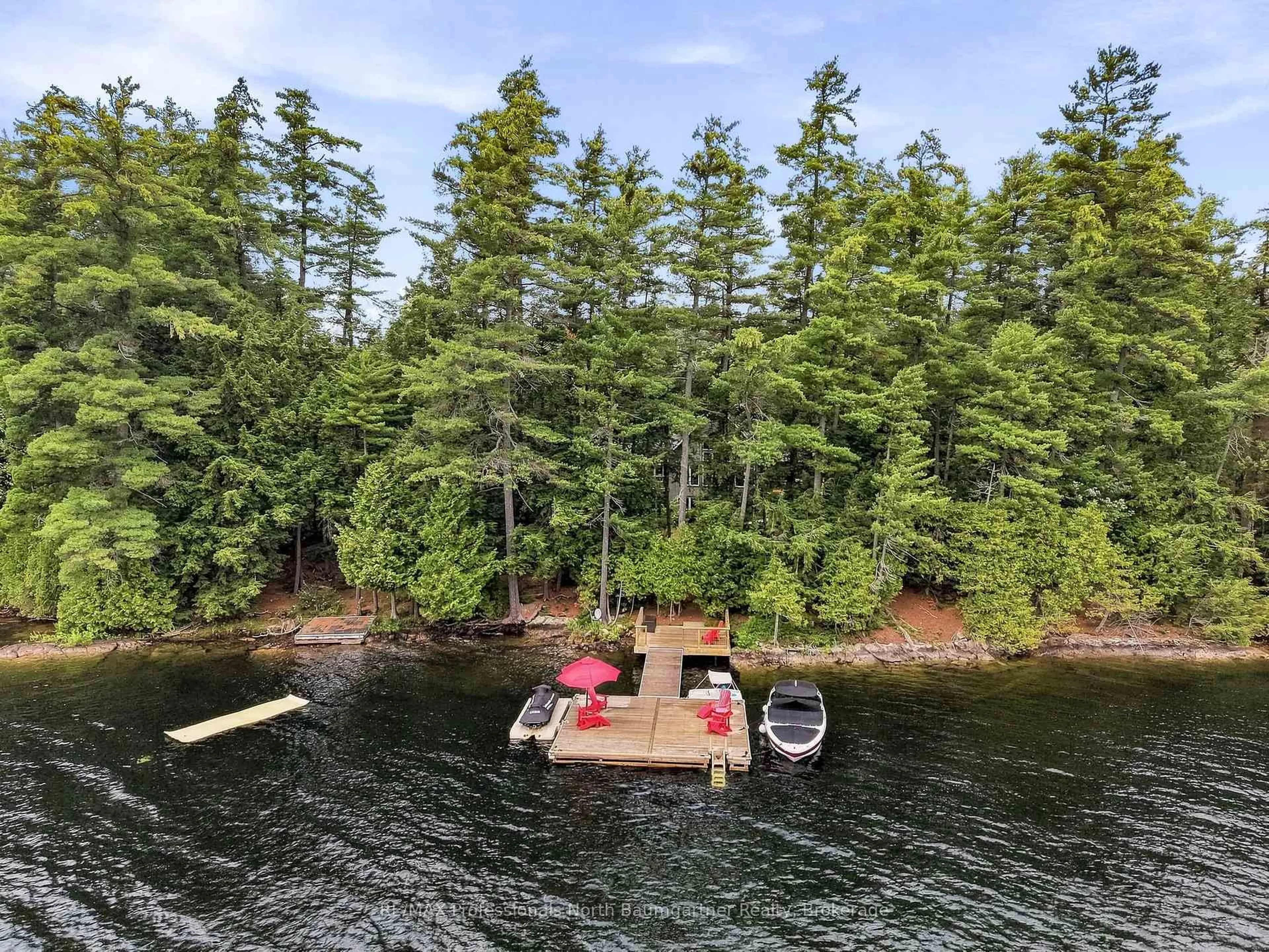 A pic from outside/outdoor area/front of a property/back of a property/a pic from drone, water/lake/river/ocean view for 3386 West Shore Rd, Dysart et al Ontario K0M 1S0