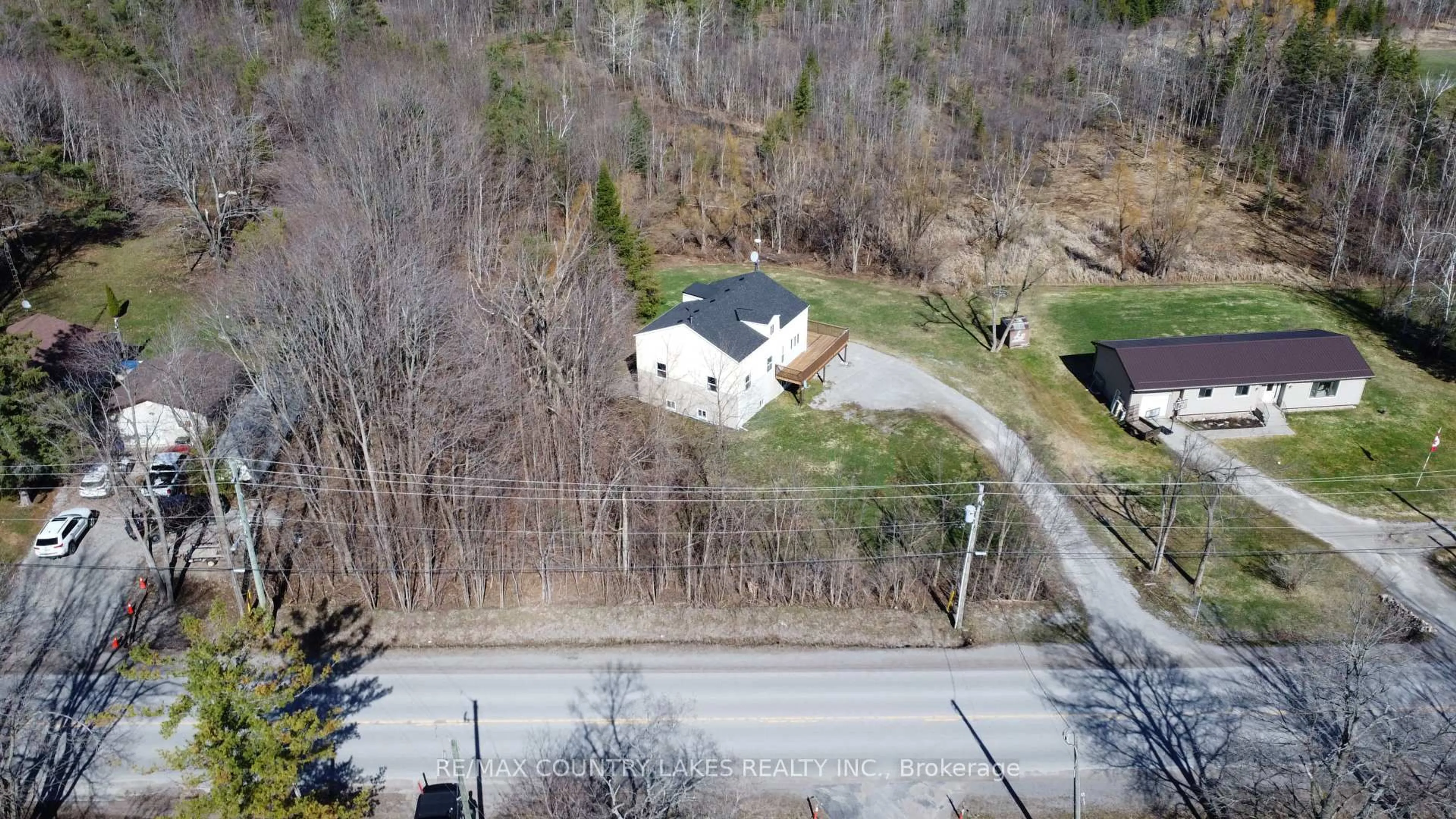 A pic from outside/outdoor area/front of a property/back of a property/a pic from drone, street for 1768 Kirkfield Rd, Kawartha Lakes Ontario K0M 2B0