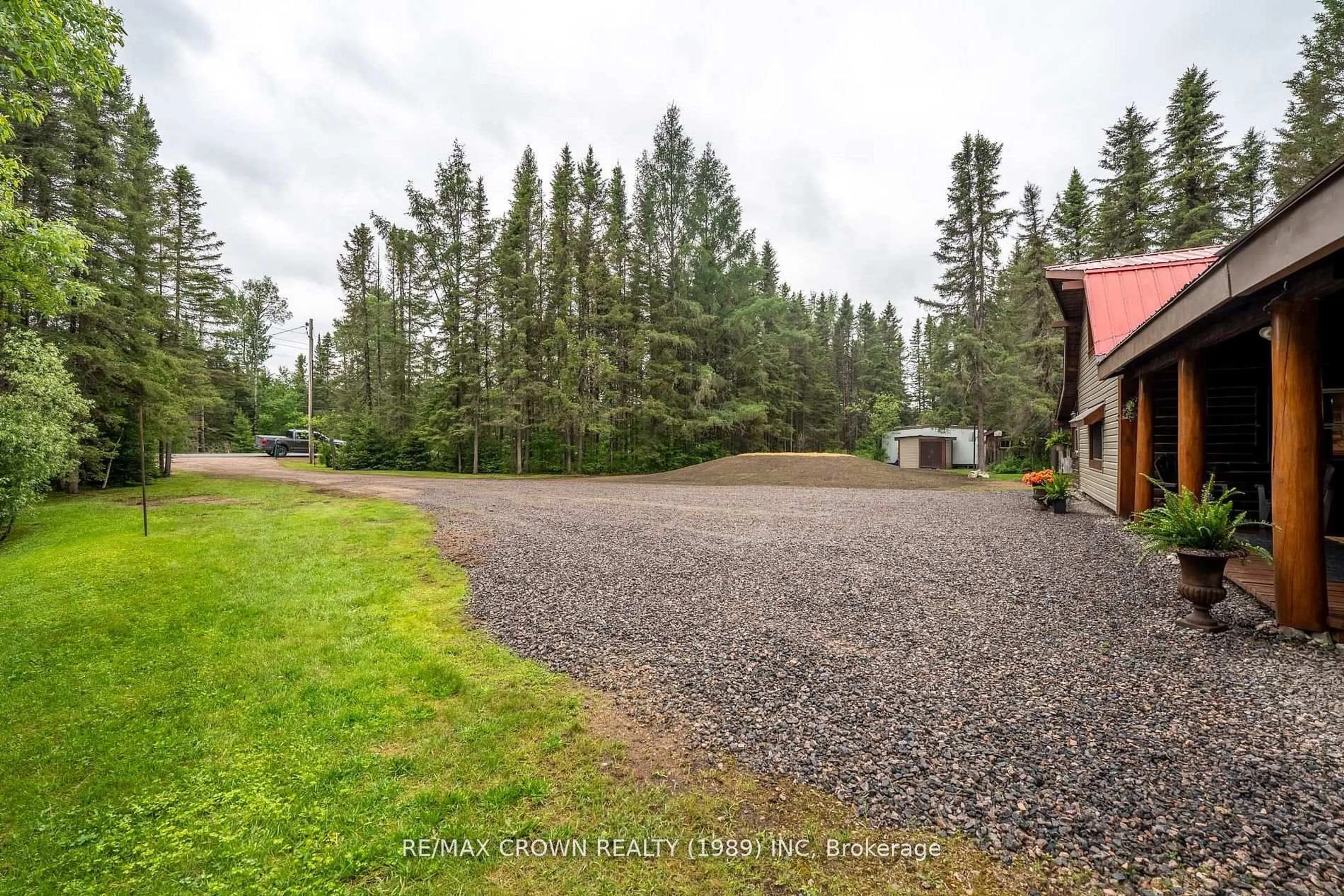 A pic from outside/outdoor area/front of a property/back of a property/a pic from drone, forest/trees view for 734 Highway 522, Powassan Ontario P0H 2L0