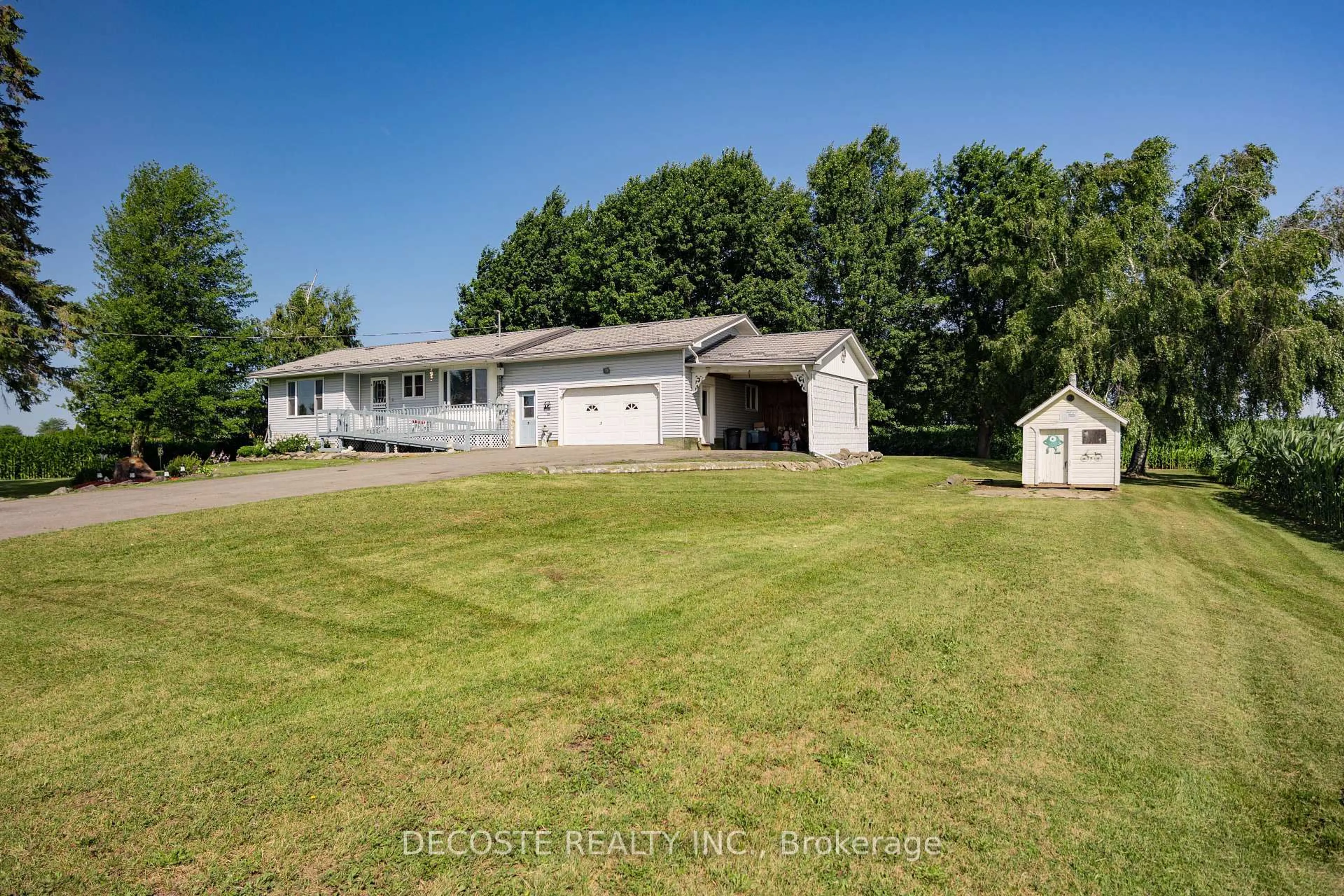 A pic from outside/outdoor area/front of a property/back of a property/a pic from drone, water/lake/river/ocean view for 12995 River Rd, North Dundas Ontario K0C 1H0