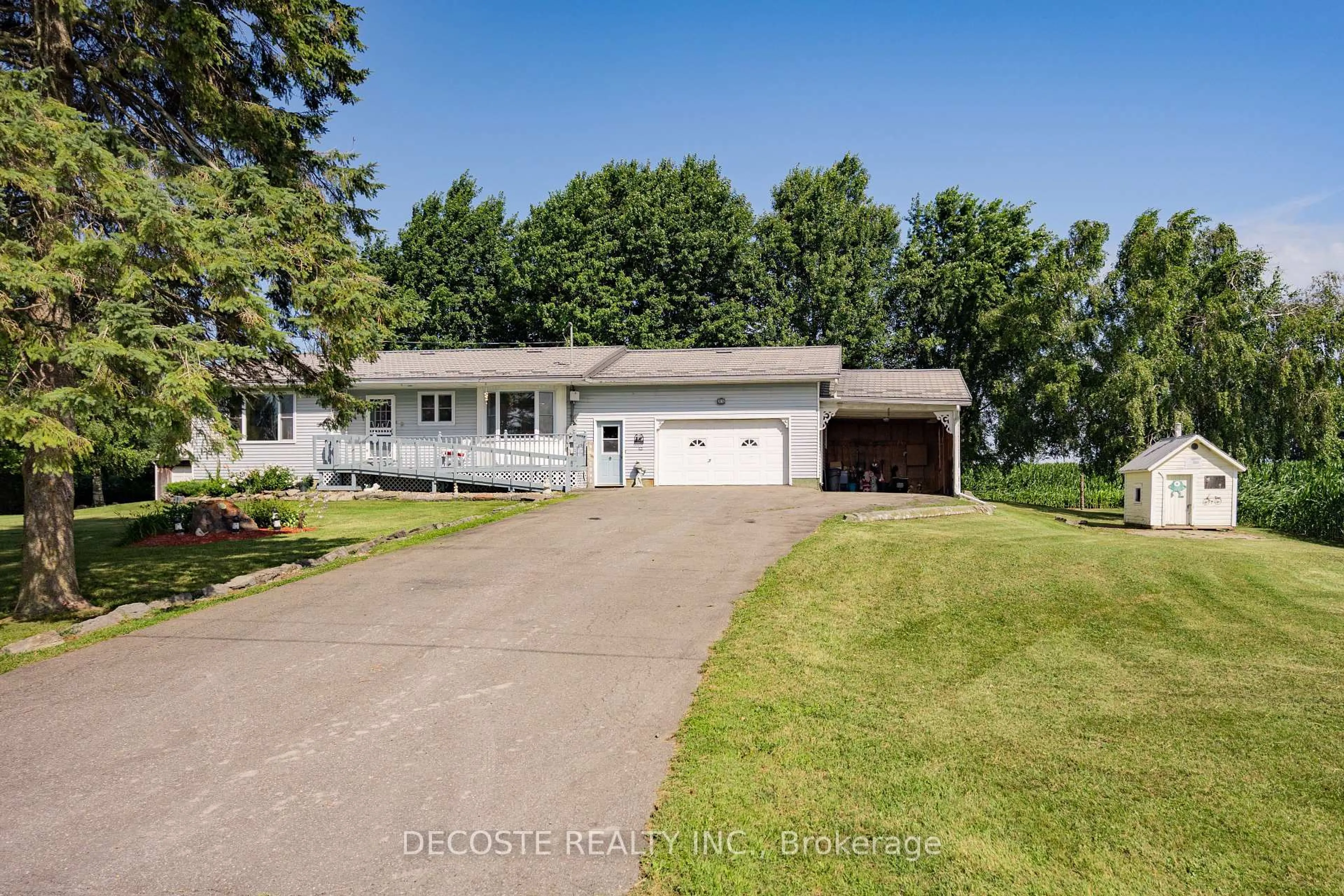 A pic from outside/outdoor area/front of a property/back of a property/a pic from drone, water/lake/river/ocean view for 12995 River Rd, North Dundas Ontario K0C 1H0