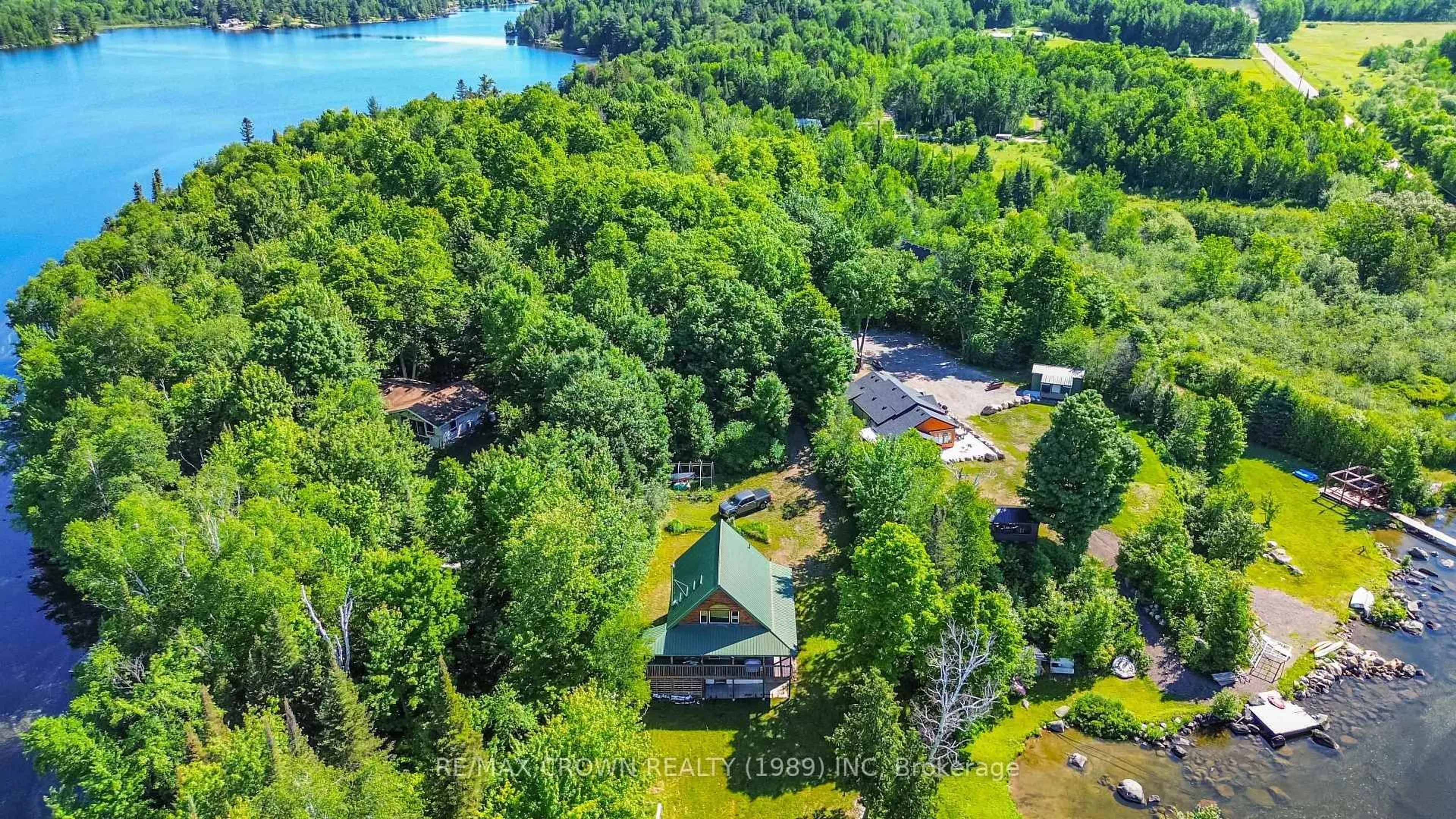 A pic from outside/outdoor area/front of a property/back of a property/a pic from drone, water/lake/river/ocean view for 102 North Star Dr, Bonfield Ontario P0H 1E0