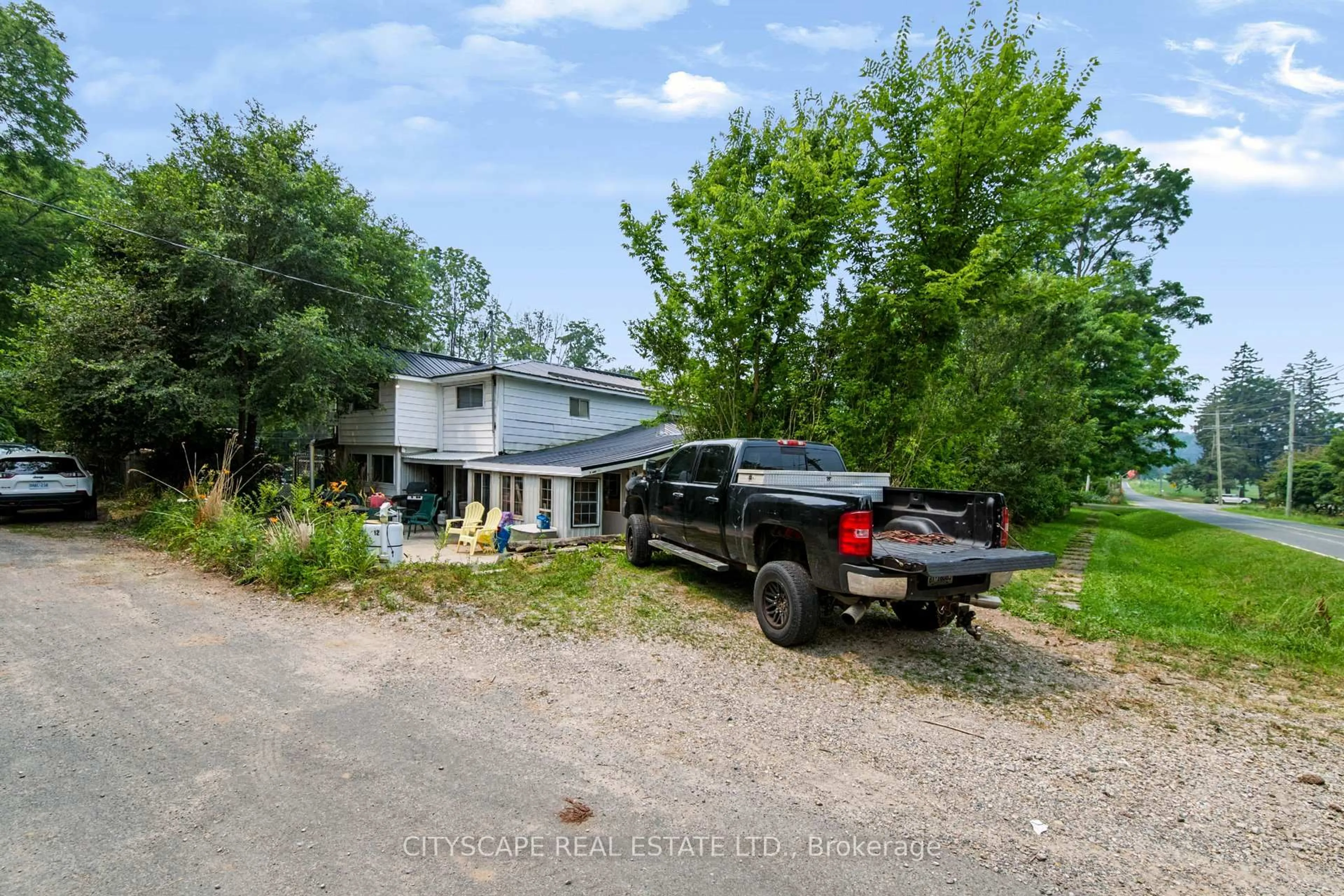 A pic from outside/outdoor area/front of a property/back of a property/a pic from drone, street for 12 Enos St, Blandford-Blenheim Ontario N0J 1G0