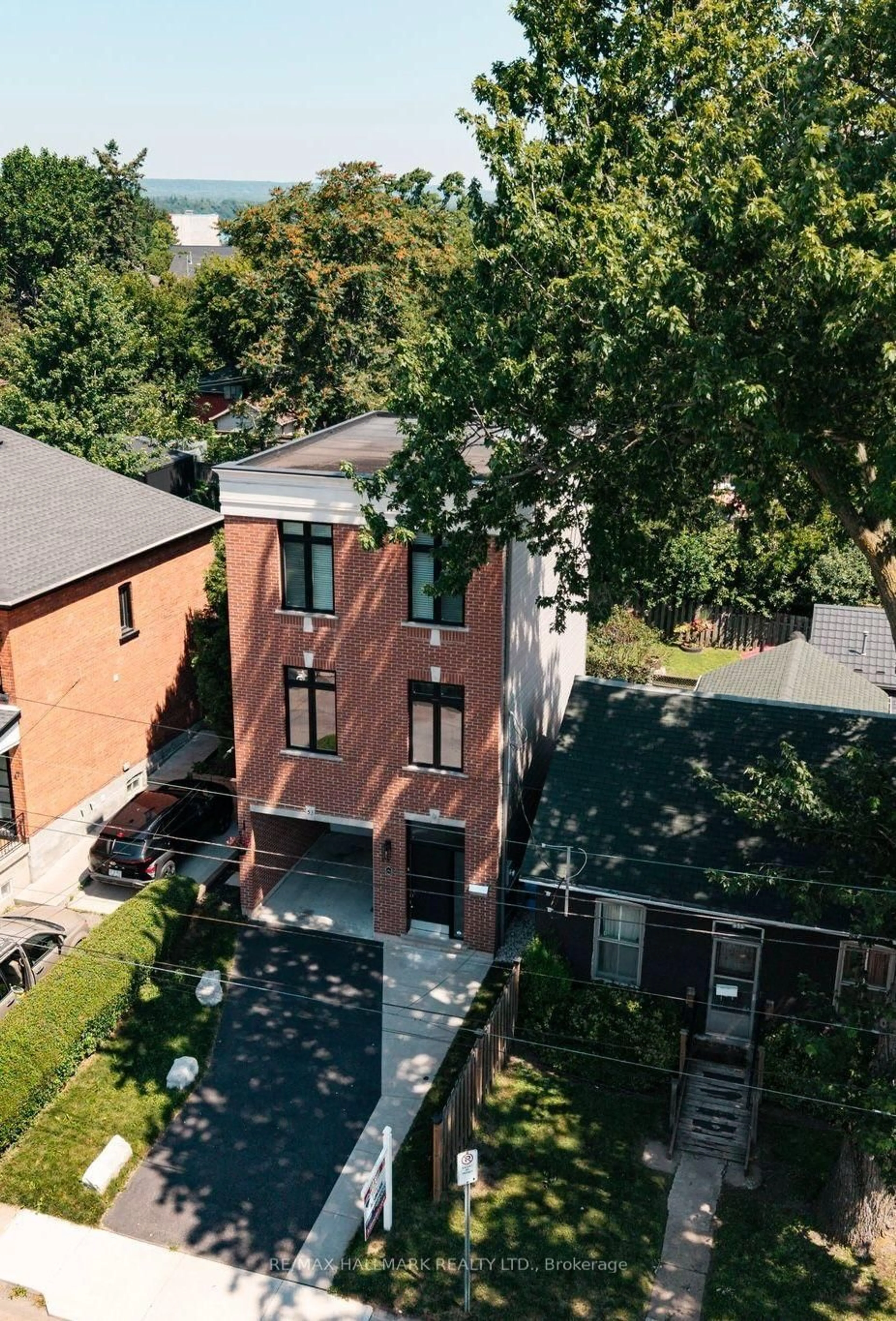 Home with brick exterior material, street for 53 Wood St, Hamilton Ontario L8L 3Y2